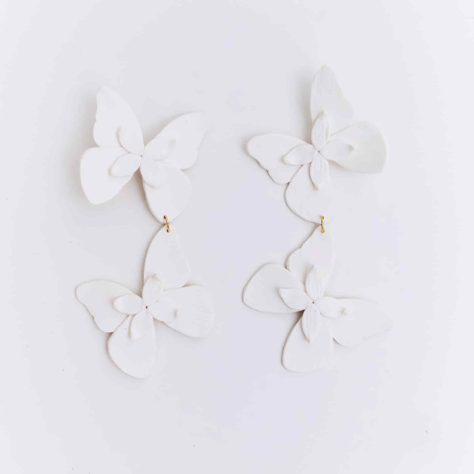 Aretes Alas en Flor Doble - miniatura 2