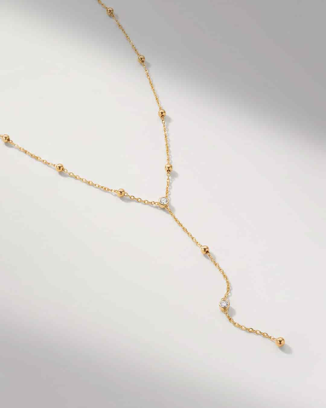 Collar Largo Esferas Oro - miniatura 1