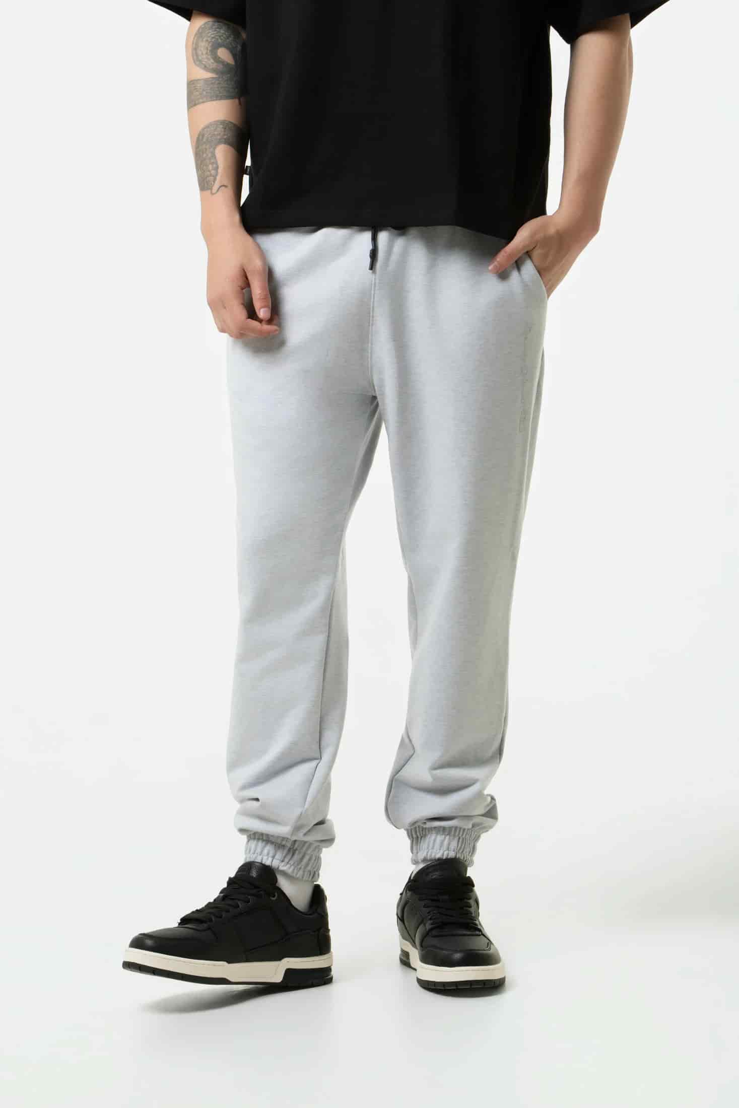 PANTALON JOGG COLOR GRIS JASPE CLARO - miniatura 2