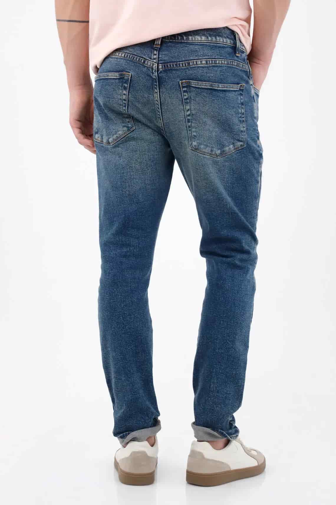 Jean skinny con lavado desgastado en denim de algodón azul medio para hombre - miniatura 5