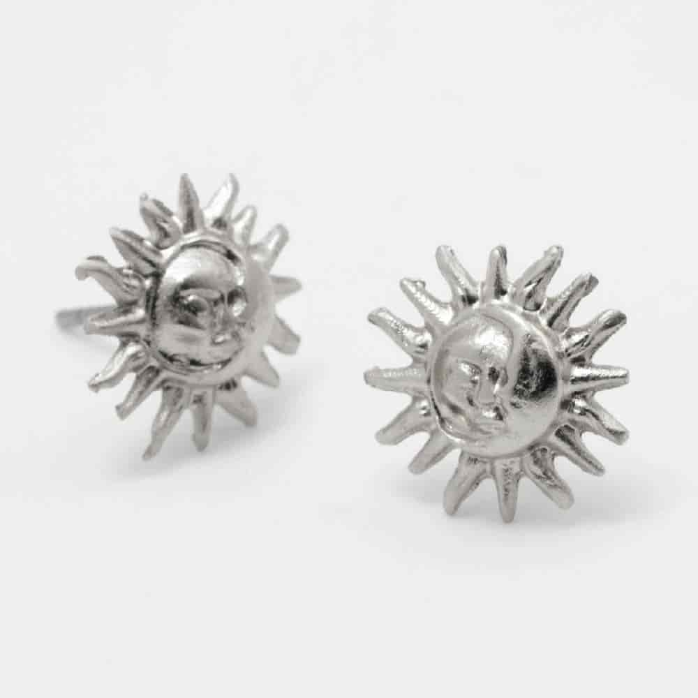 Aretes Sol de Rumbo Plateado - miniatura 1