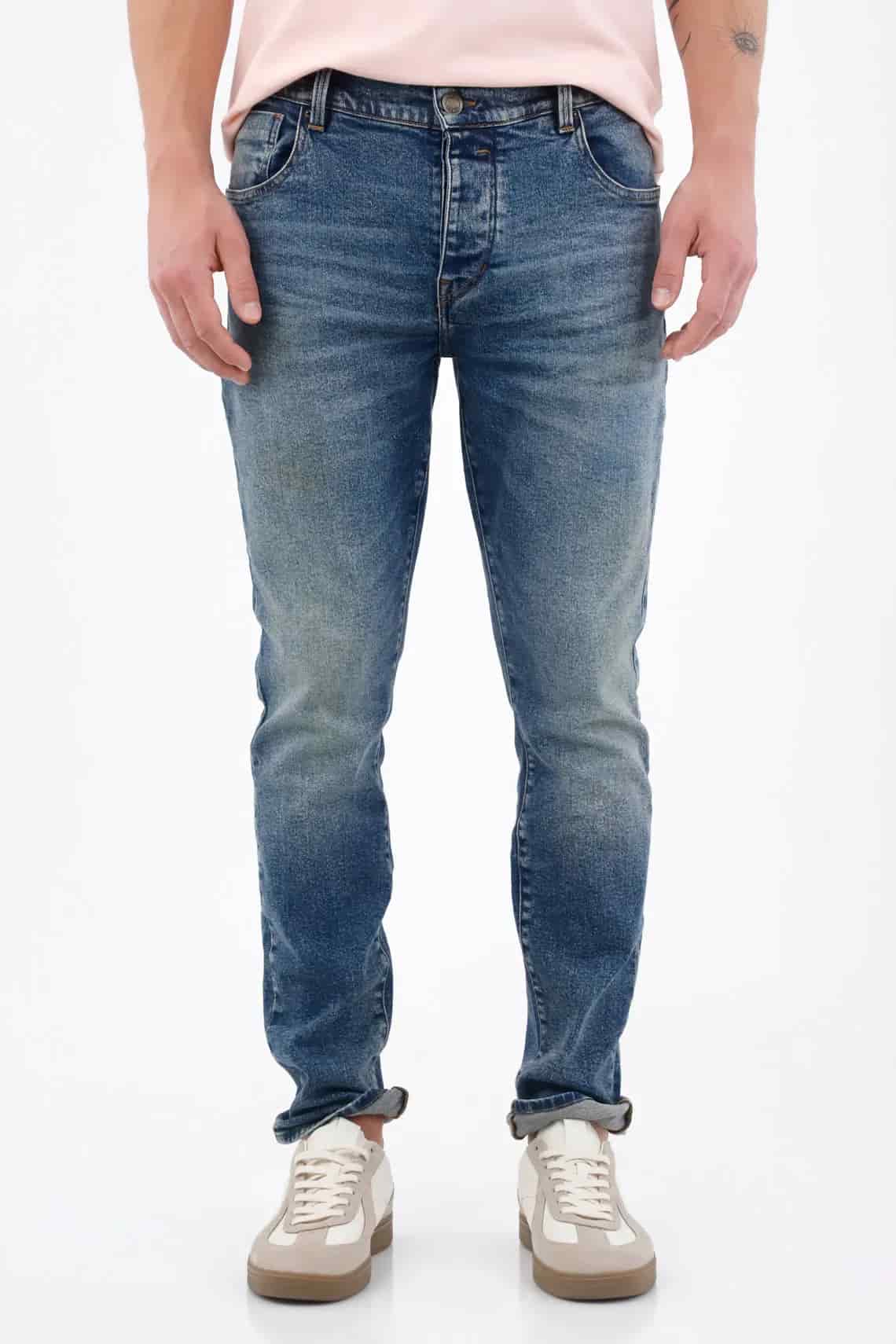 Jean skinny con lavado desgastado en denim de algodón azul medio para hombre - miniatura 1
