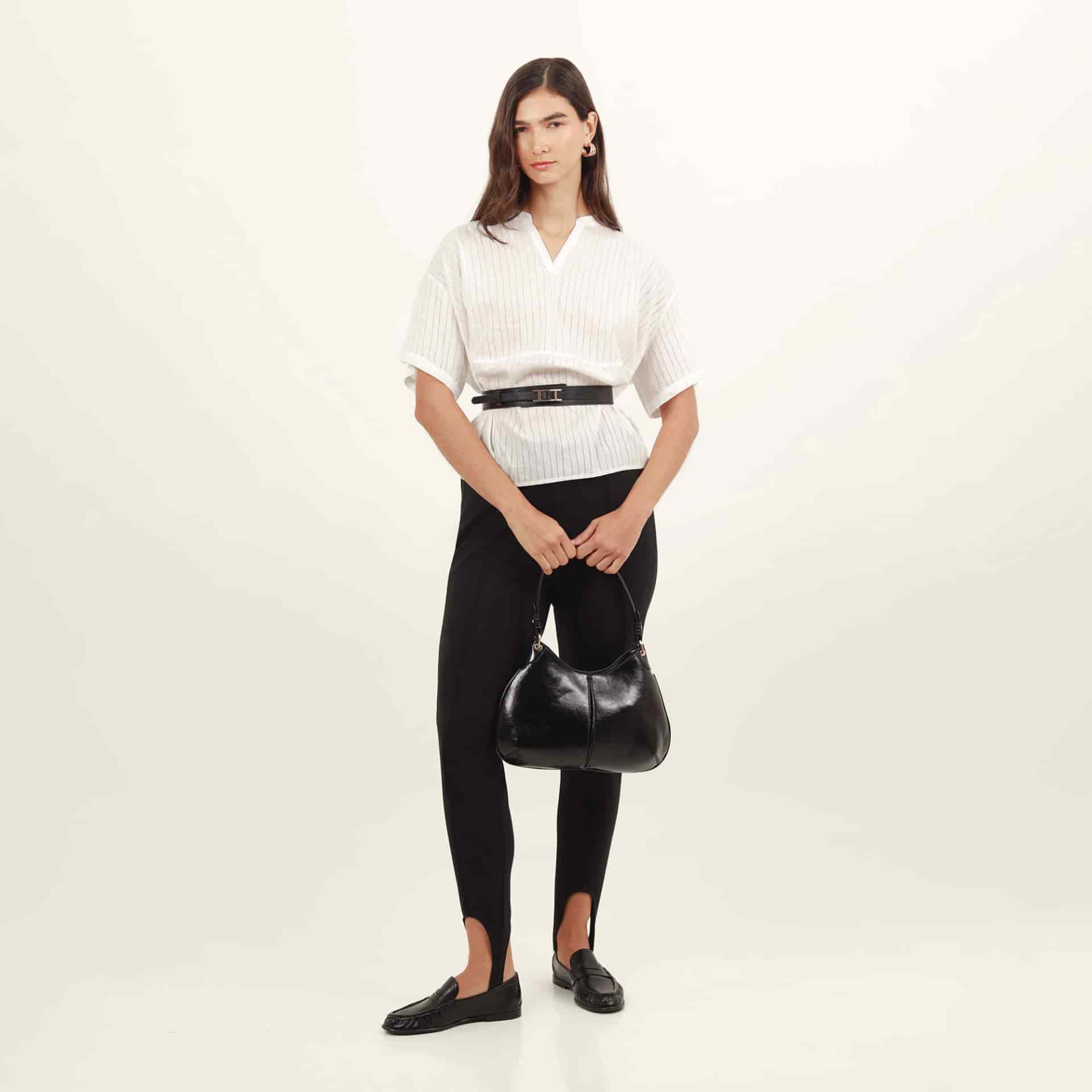 Pantalón con estribo tiro medio bota skinny - miniatura 1