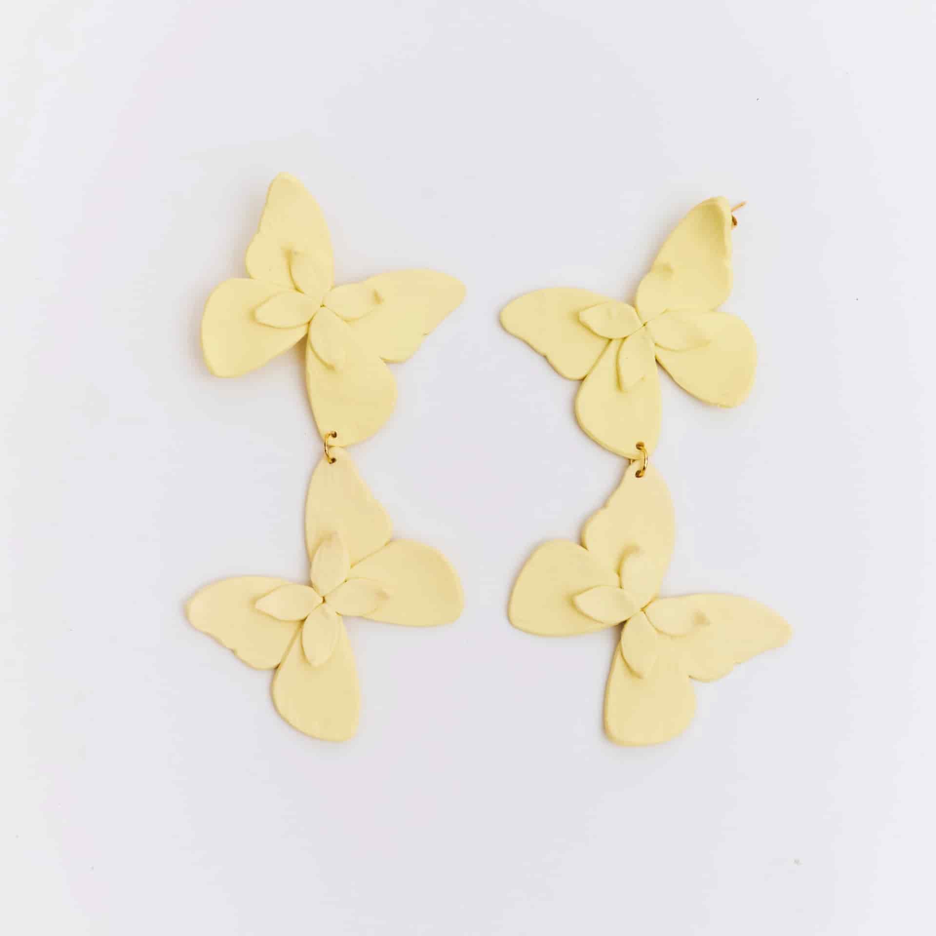 Aretes Alas en Flor Doble - miniatura 3