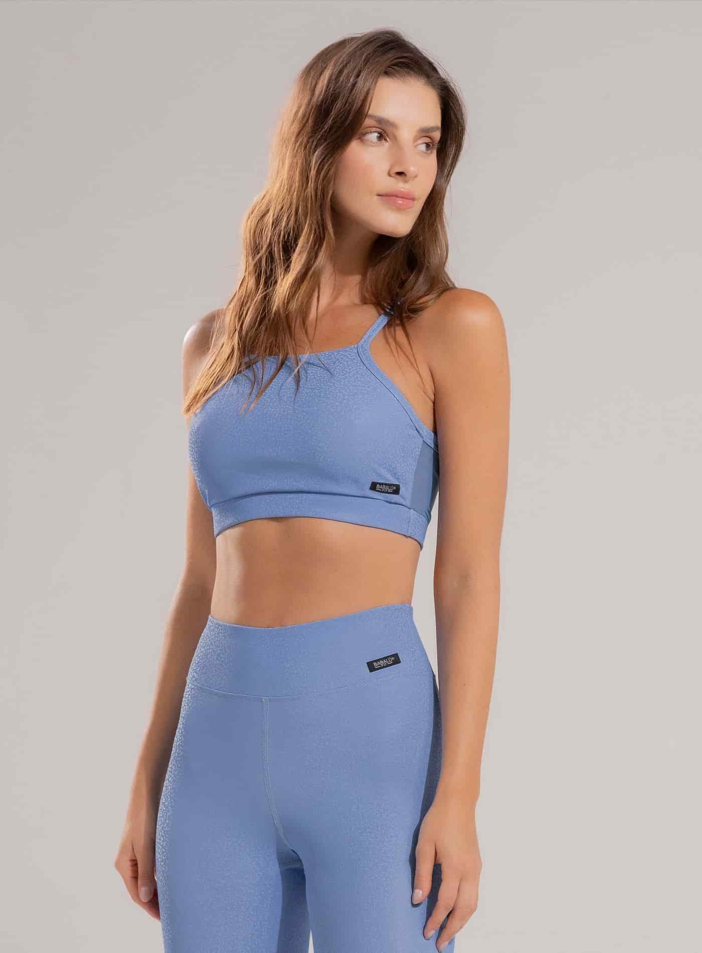 TOP DEPORTIVO EN TELA CON ACABADO BRILLANTE - PRECIO ESPECIAL - miniatura 1