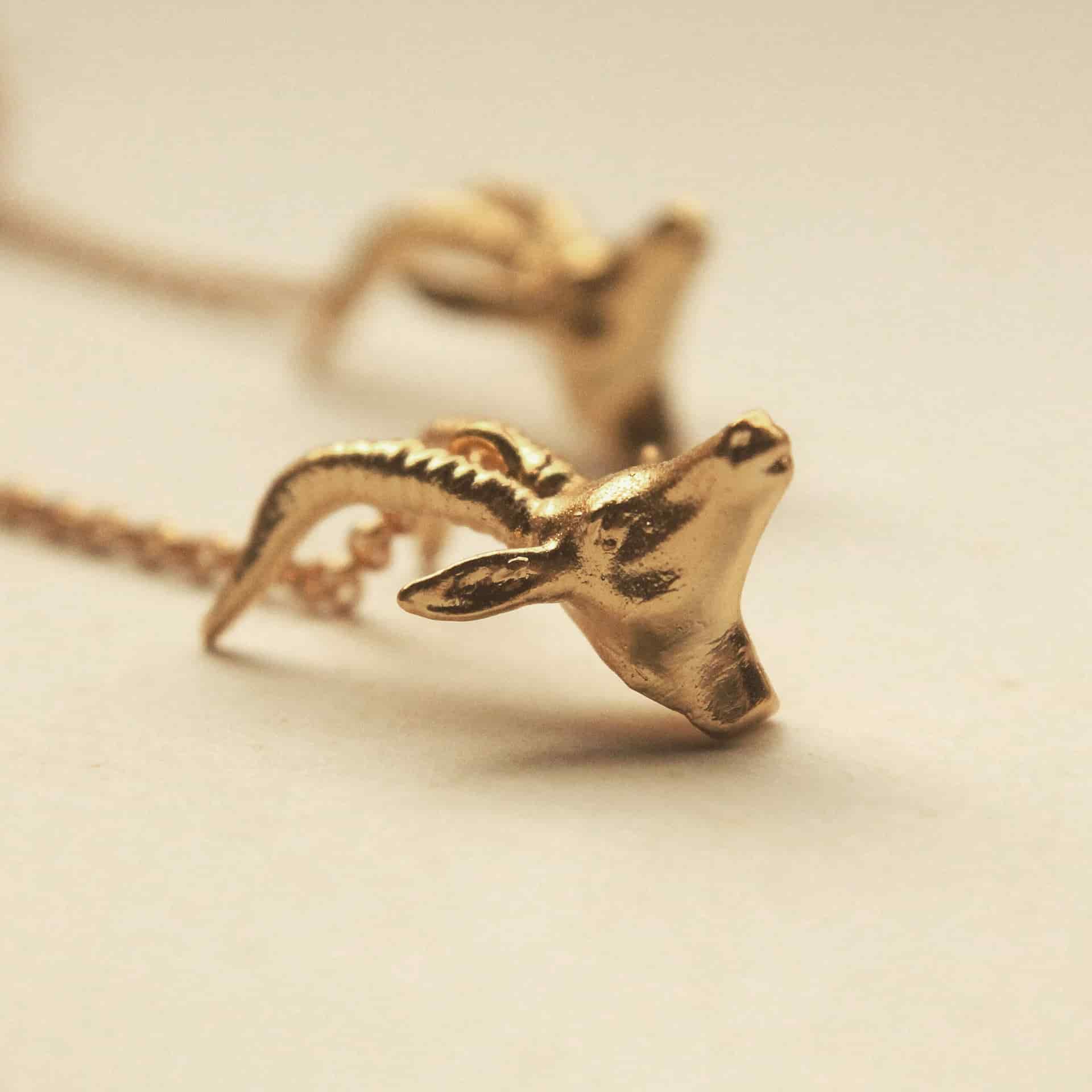 Aretes largos con cabeza de antílope - miniatura 3