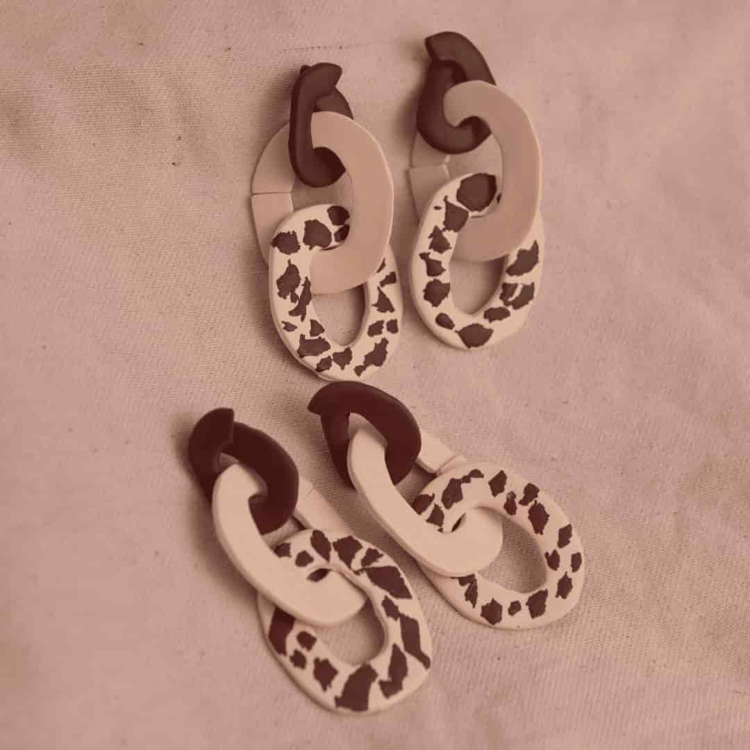 Aretes Lau Pantoja Cow Print - miniatura 1