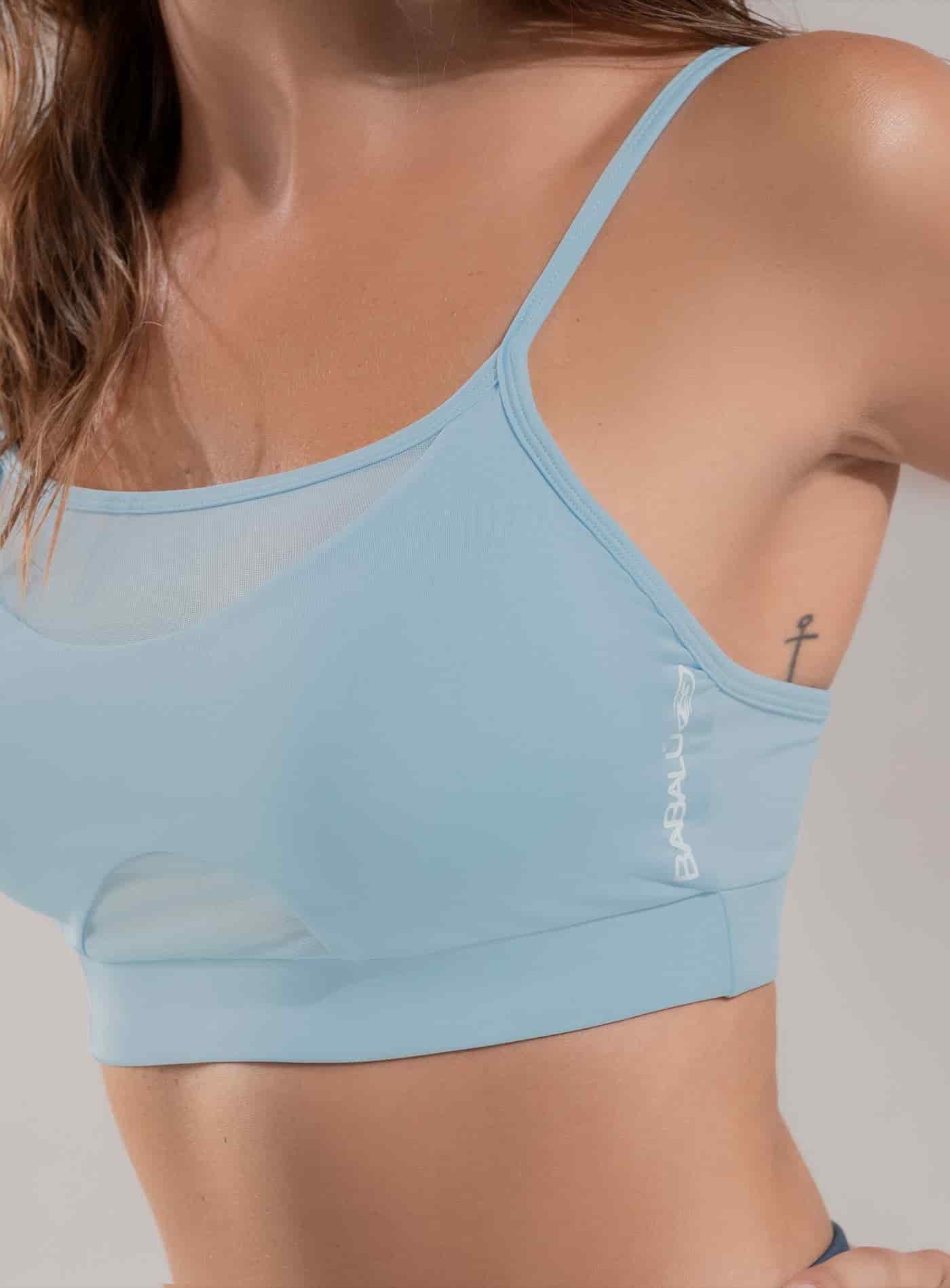 TOP DEPORTIVO CON ESCOTE EN MALLA SEMI TRANSPARENTE - miniatura 2