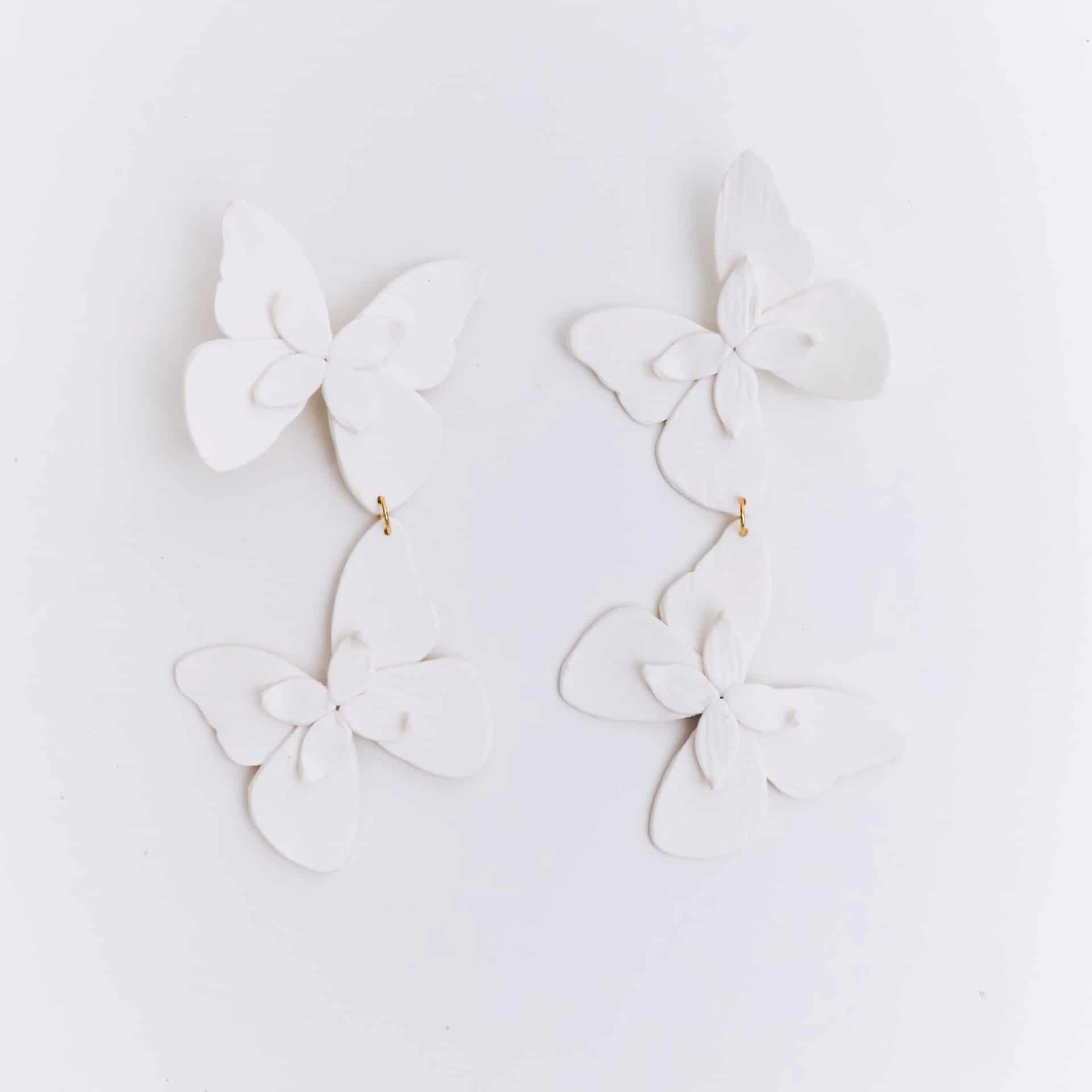 Aretes Alas en Flor Doble - miniatura 2