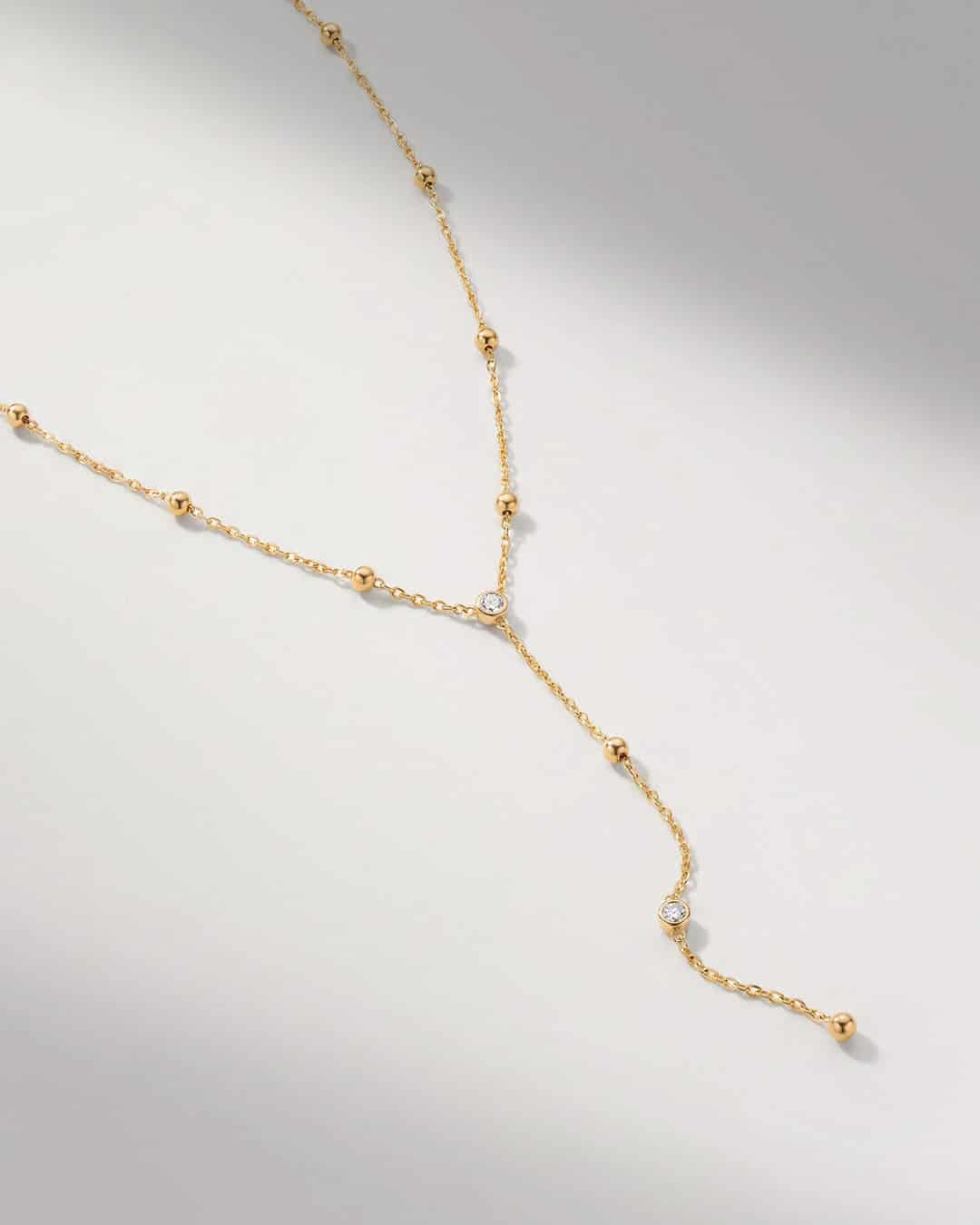 Collar Largo Esferas Oro - miniatura 1