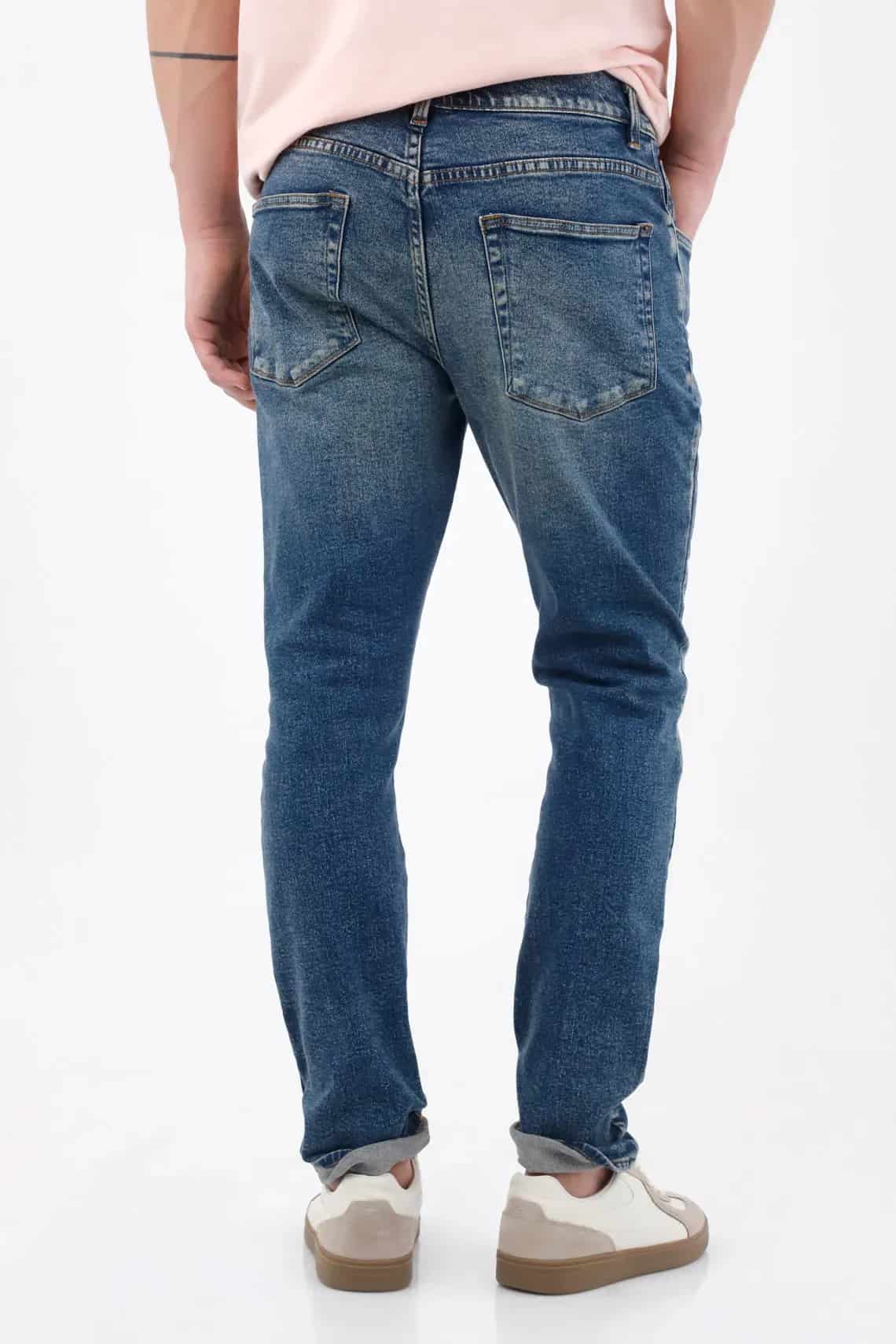 Jean skinny con lavado desgastado en denim de algodón azul medio para hombre - miniatura 5
