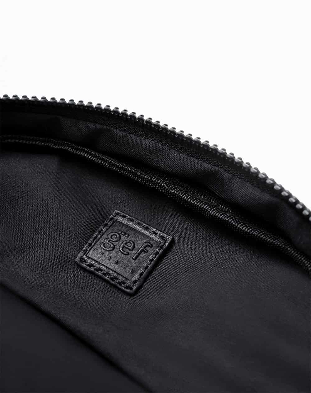 Estuche negro mujer - miniatura 2