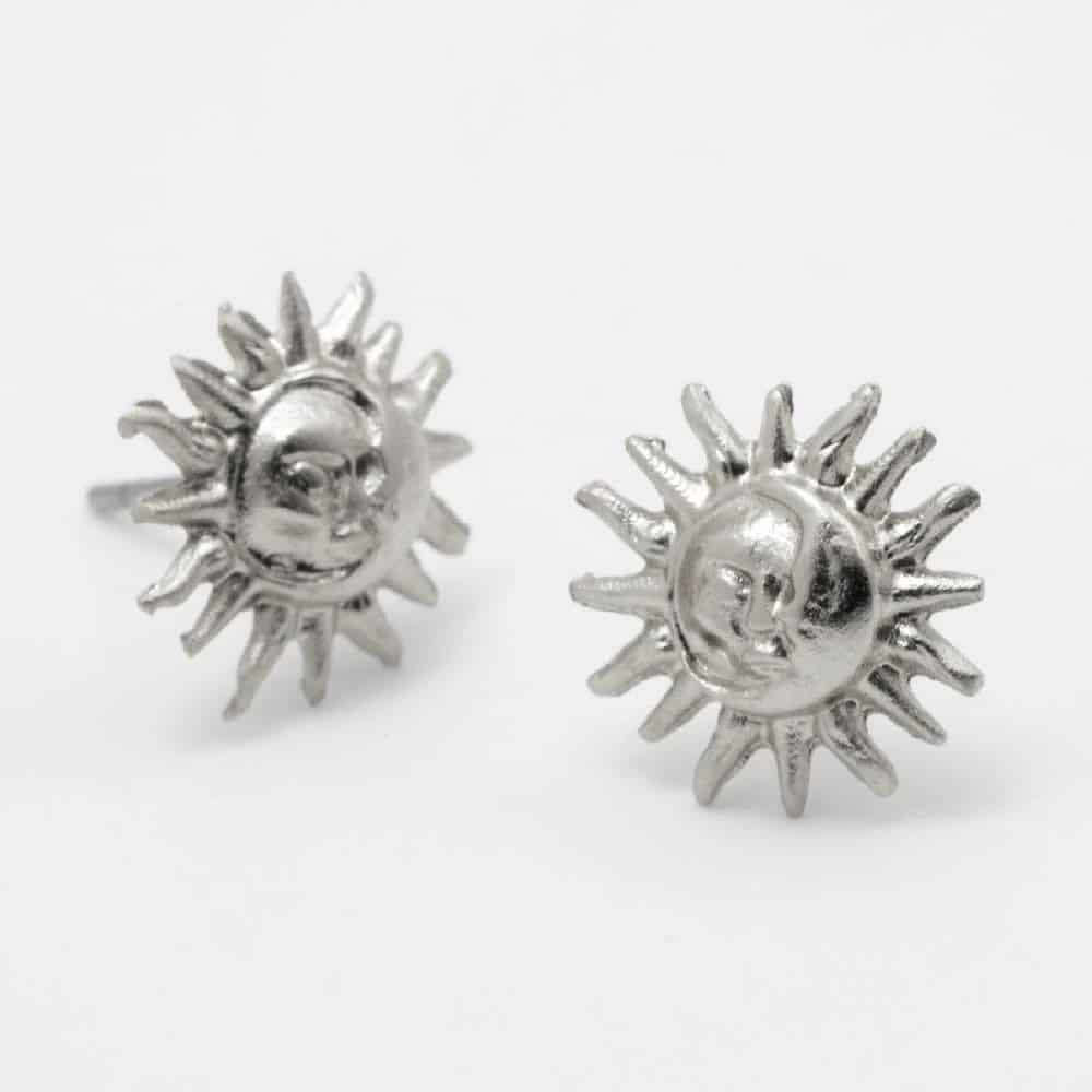 Aretes Sol de Rumbo Plateado - miniatura 1