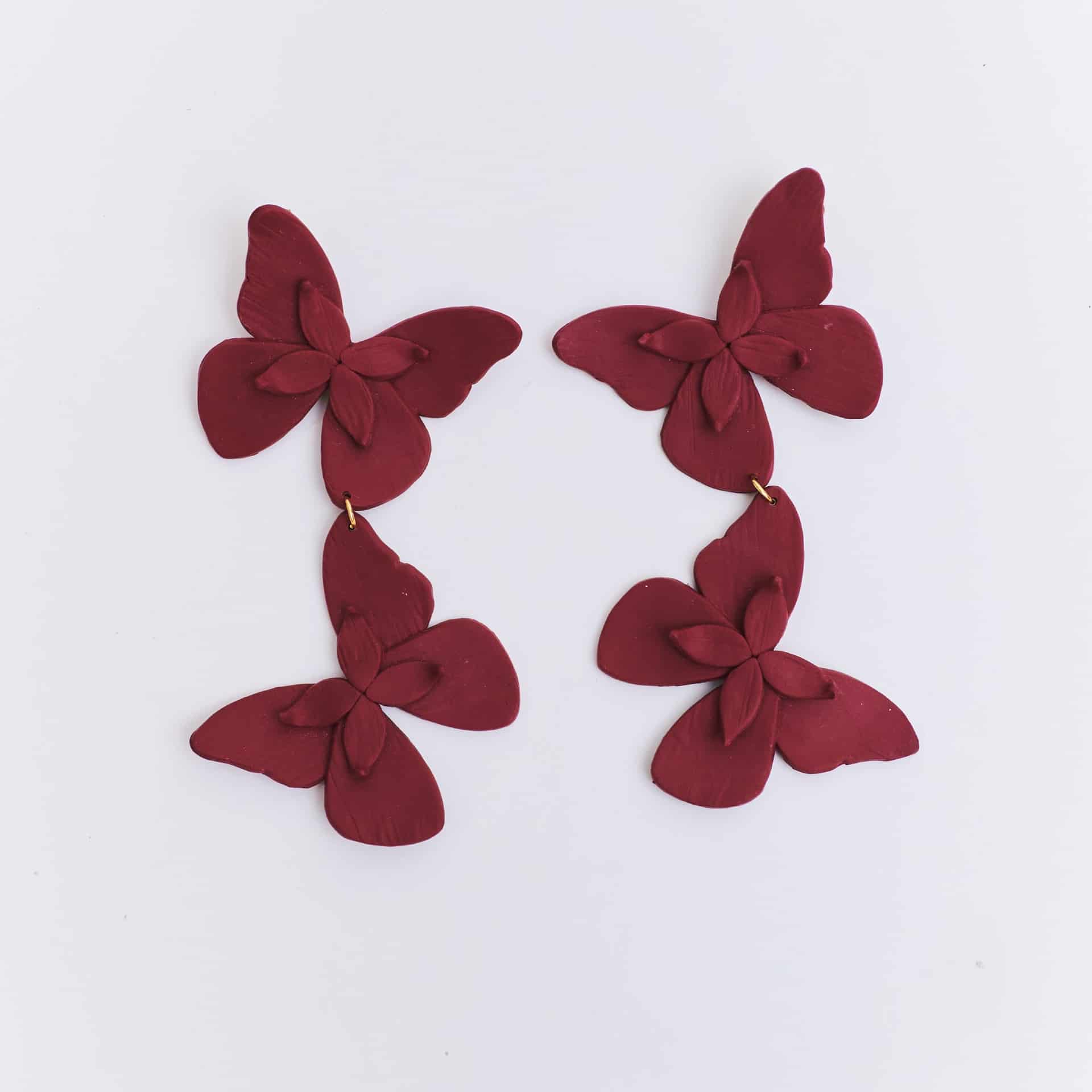 Aretes Alas en Flor Doble - miniatura 1