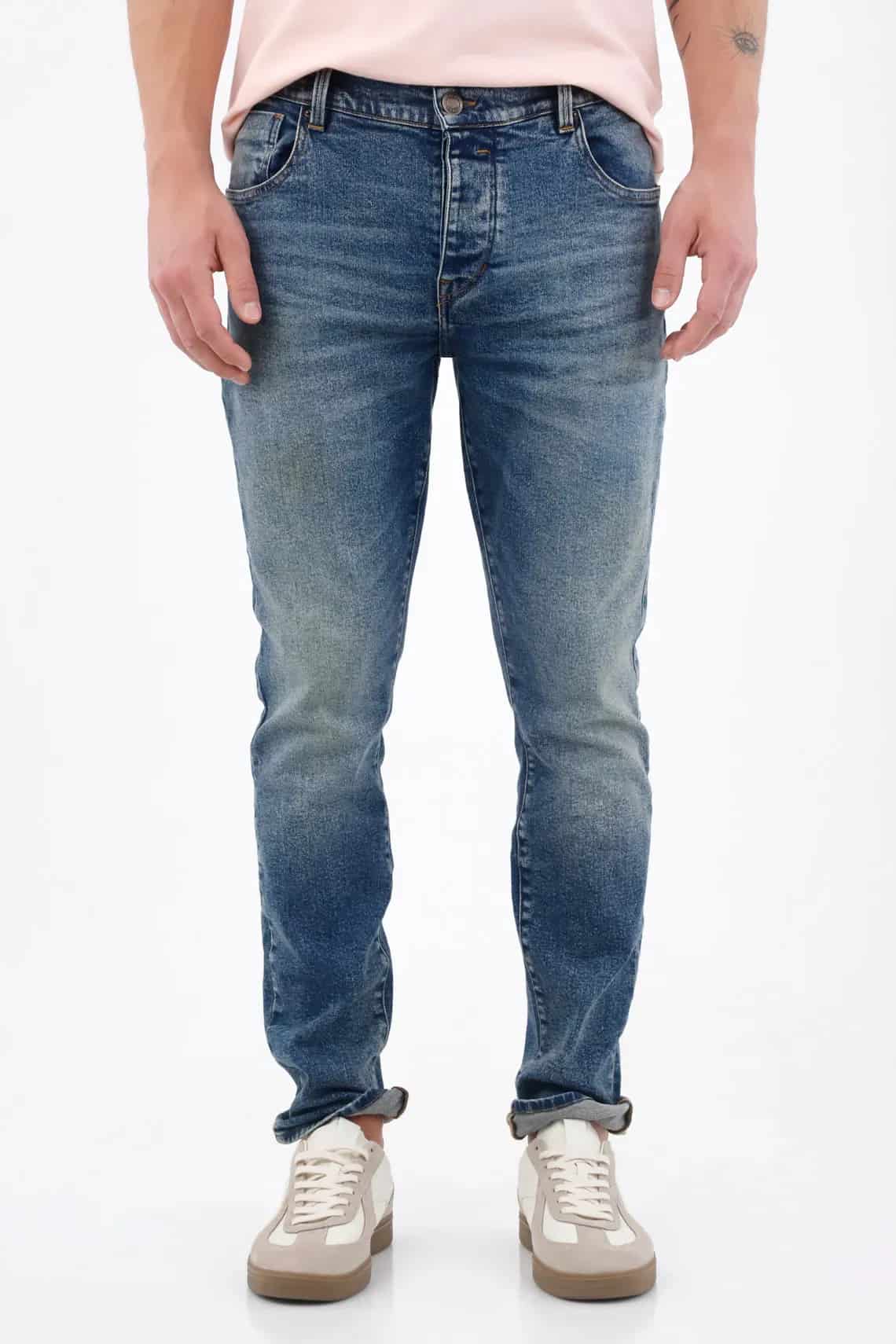 Jean skinny con lavado desgastado en denim de algodón azul medio para hombre - miniatura 1