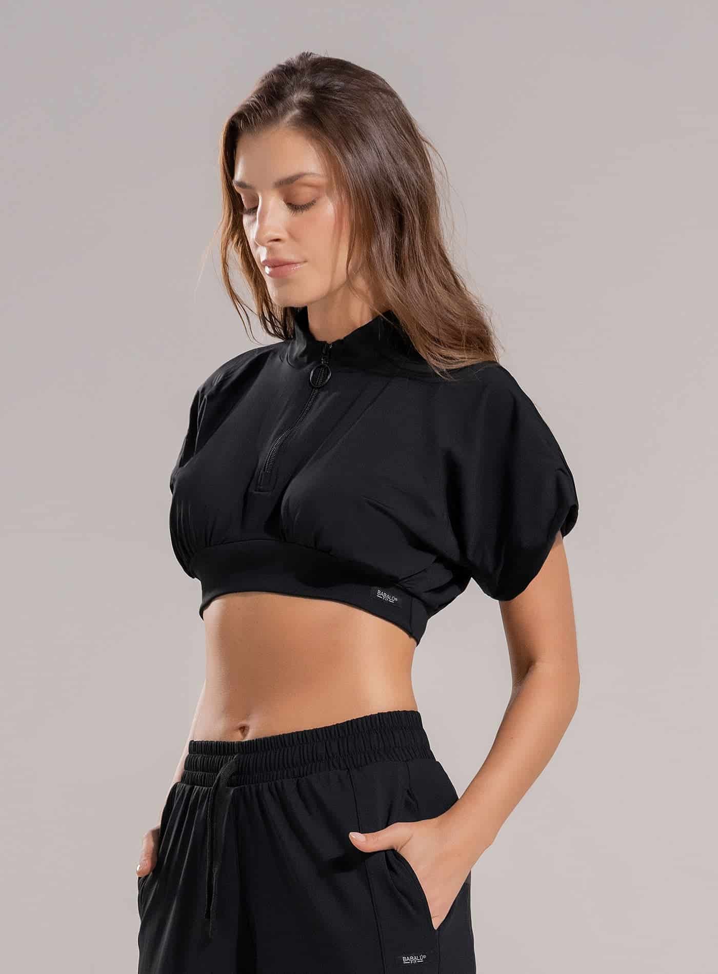 TOP DEPORTIVO TELA SHERY CUELLO ALTO CON CIERRE - PRECIO ESPECIAL - miniatura 1