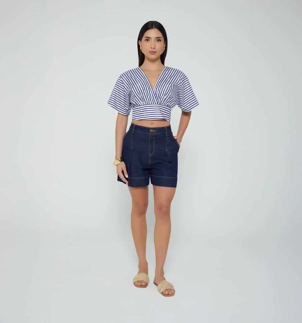 Blusa con escote cruzado - miniatura 1