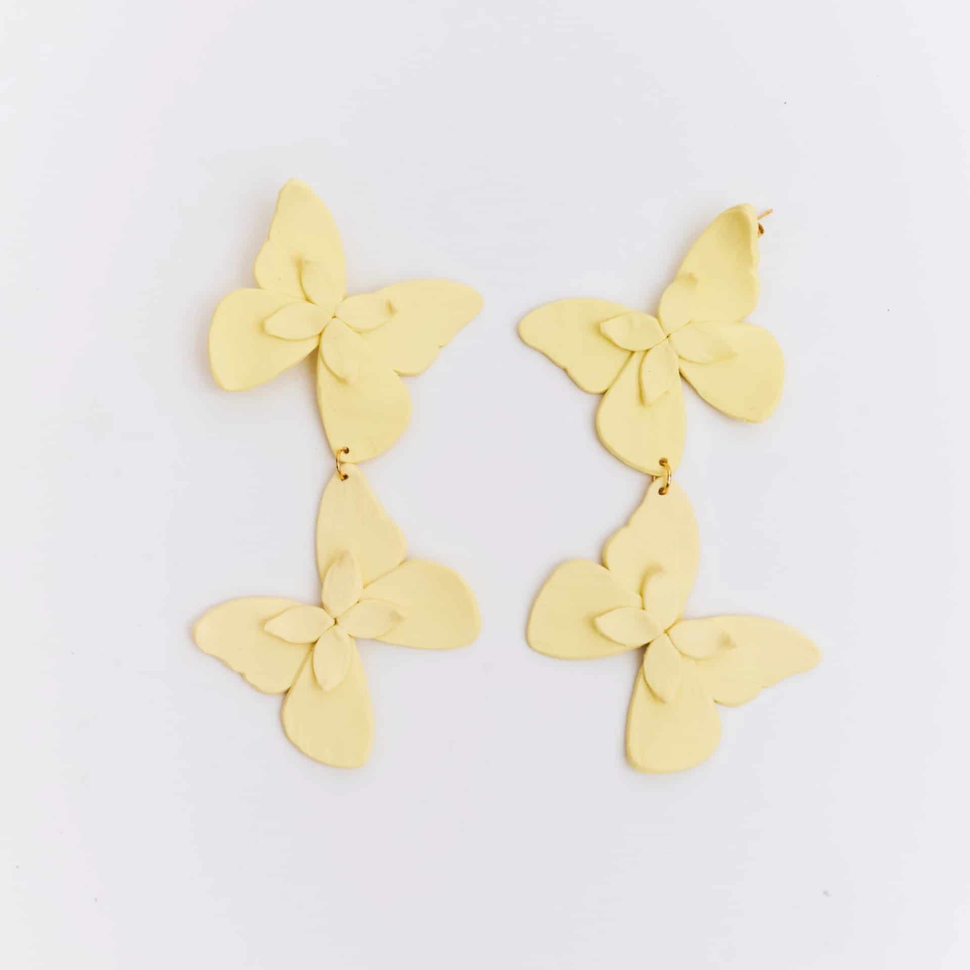 Aretes Alas en Flor Doble - miniatura 3