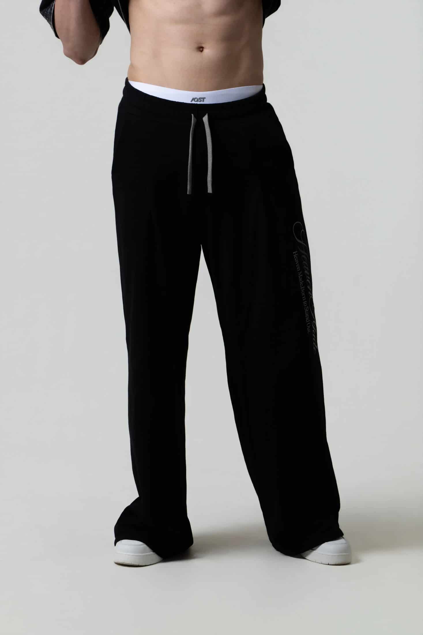 PANTALON SUDADERA COLOR NEGRO - miniatura 1