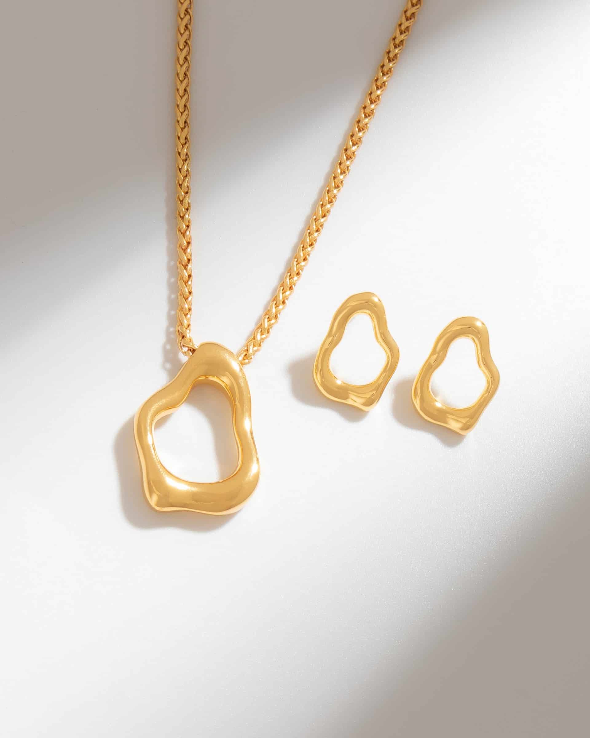 Set Collar + Aretes Silueta Amorfa - miniatura 1