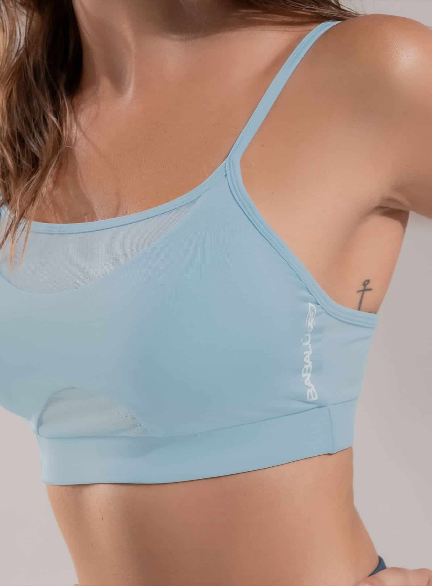 TOP DEPORTIVO CON ESCOTE EN MALLA SEMI TRANSPARENTE - miniatura 2