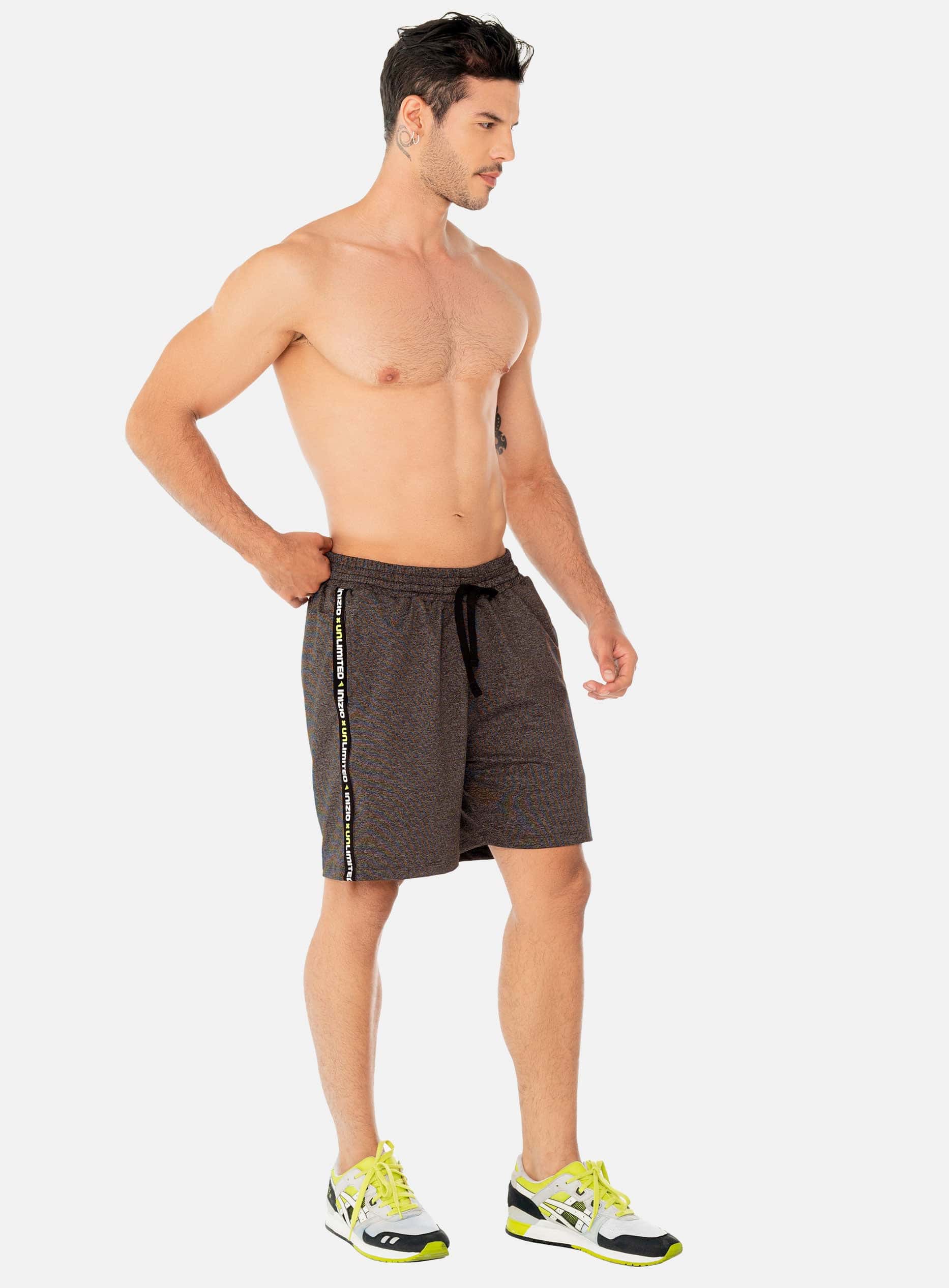 PANTALONETA DEPORTIVA  POLIÉSTER CON SHORT INTERNO