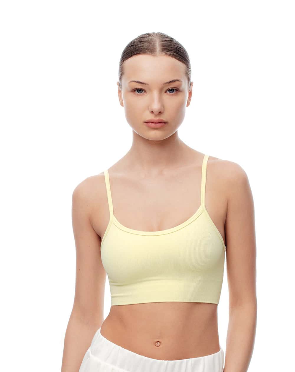 Top deportivo soporte medio seamless amarillo mujer