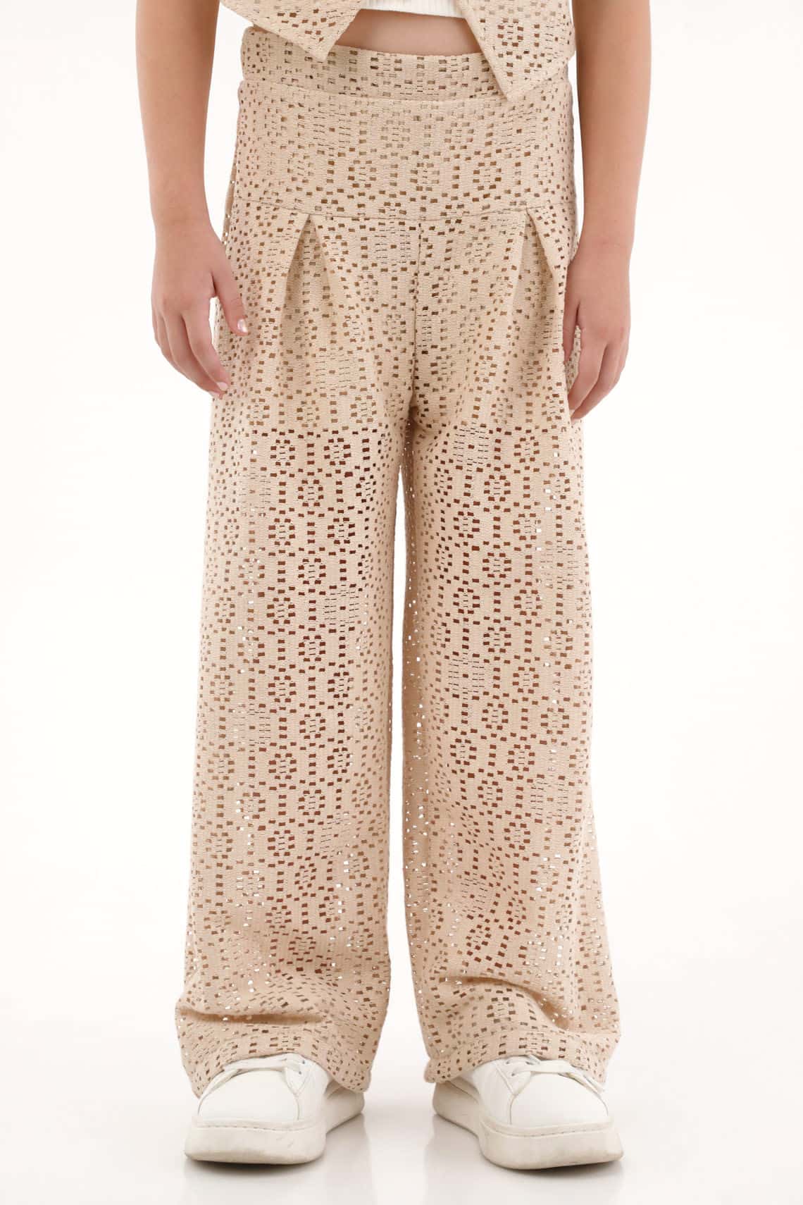 Pantalón en tela tejida crudo para niña