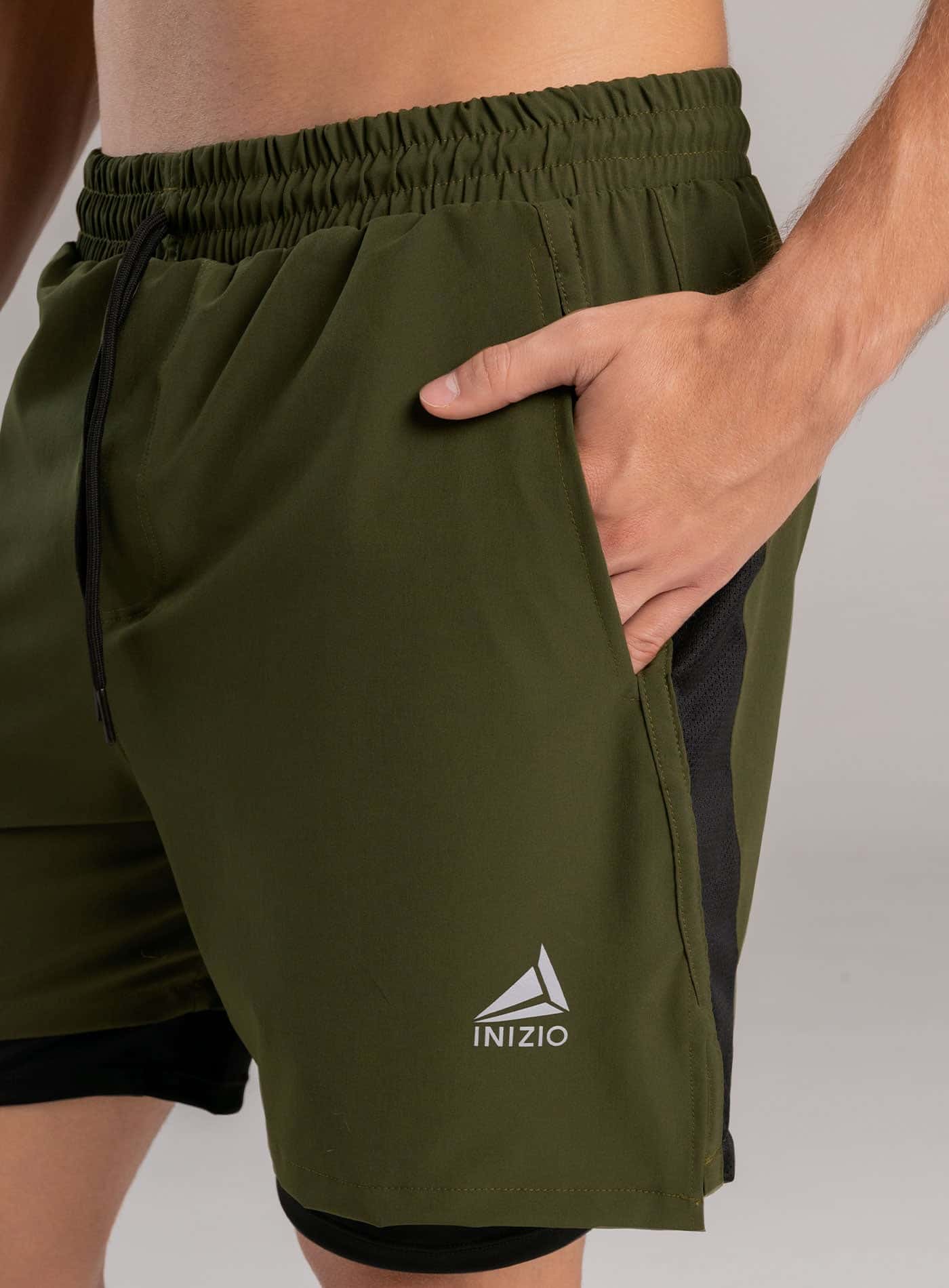 PANTALONETA DEPORTIVA SEMI IMPERMEABLE CON MALLA EN COSTADO INCLUYE SHORT INTERNO