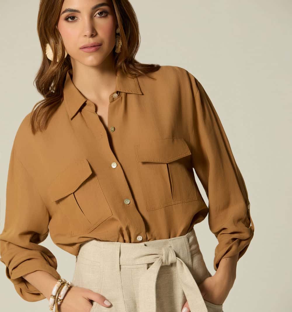 Blusa manga larga  con bolsillo