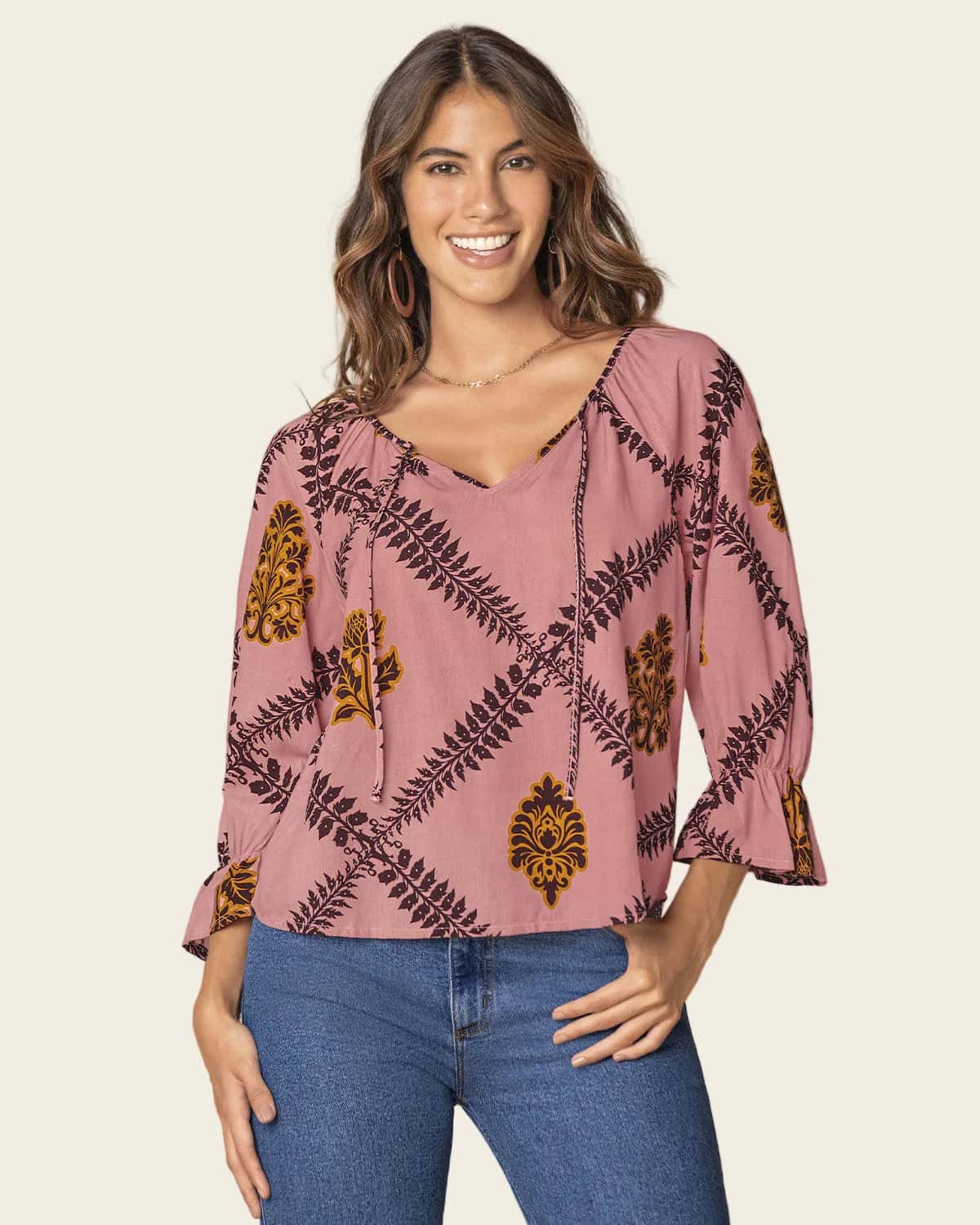 Blusa estampada manga 3/4 con elástico y bolero en puños