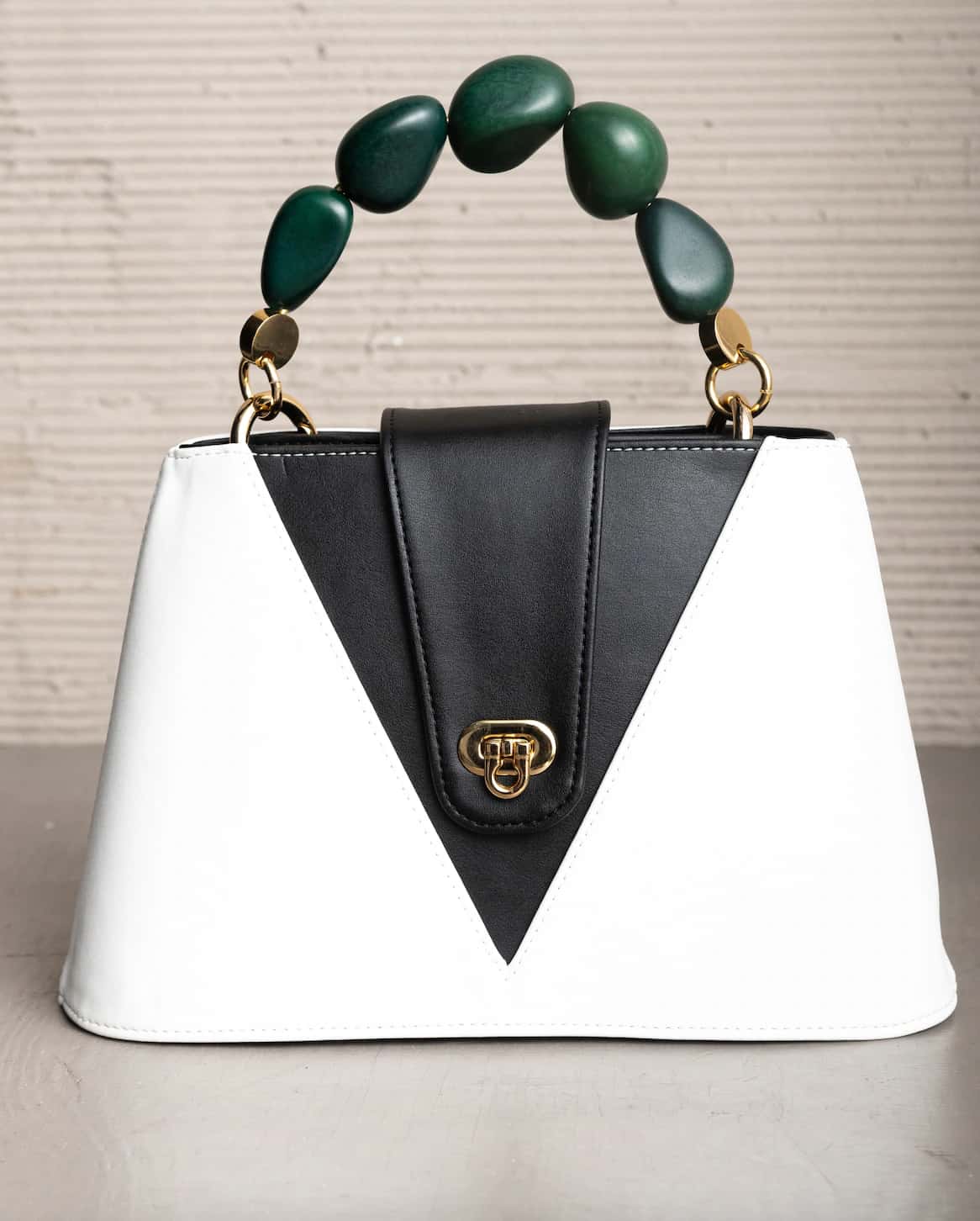 SENDA PURSE WITH TAGUA SEEDS HANDLE