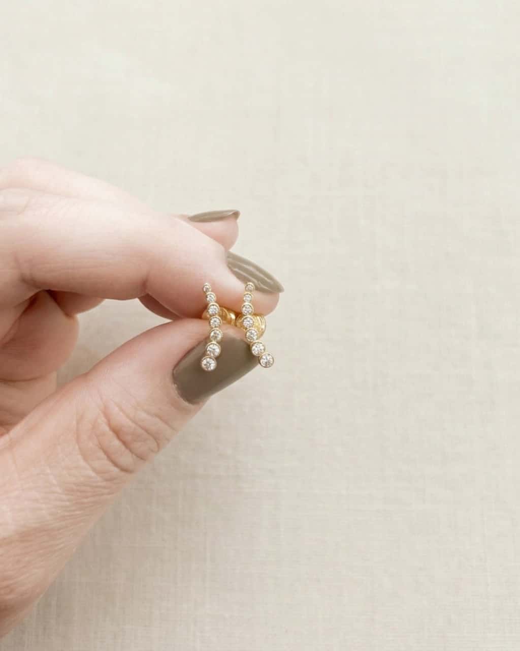 Topos en Oro 18K con Circones Blancos