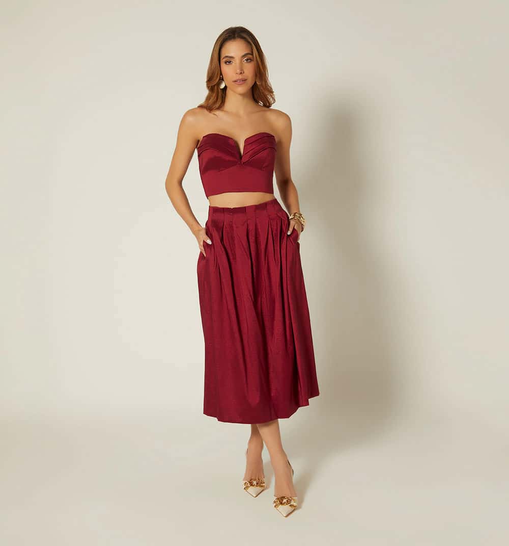 Falda midi con prenses y bolsillos