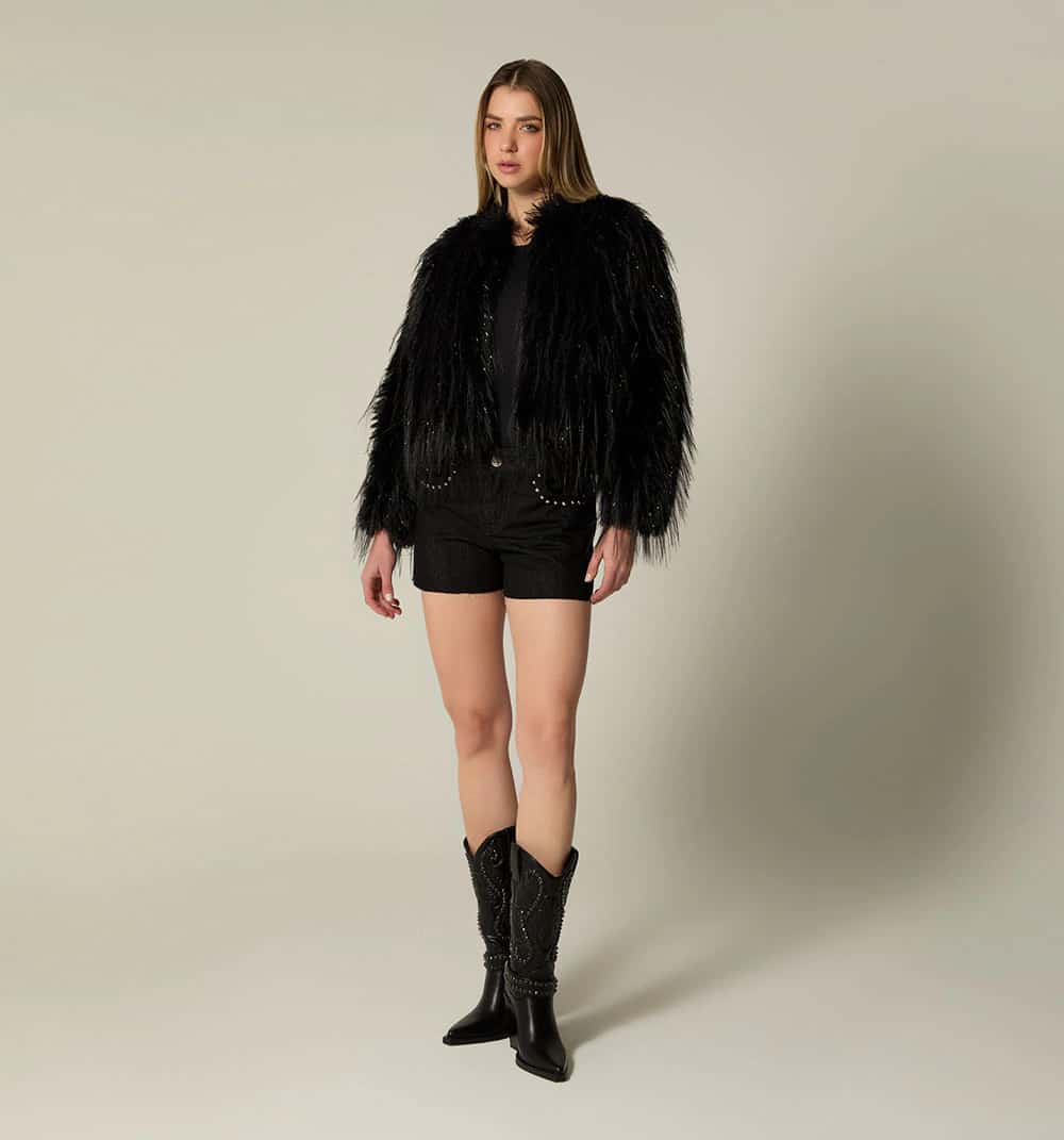 Short tiro medio bolsillos con taches