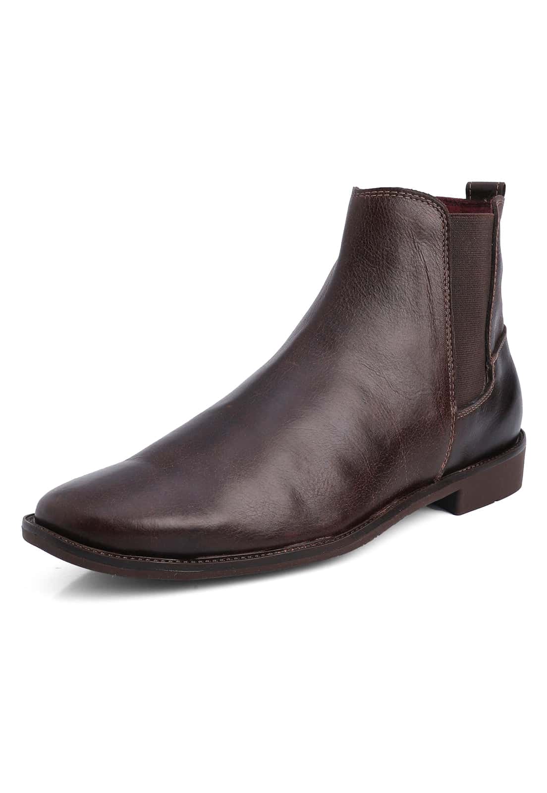 Botines chelsea cafe en cuero.