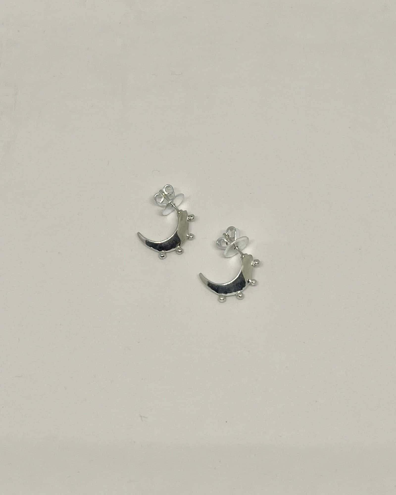 Chiqui Crescent Hoops Silver