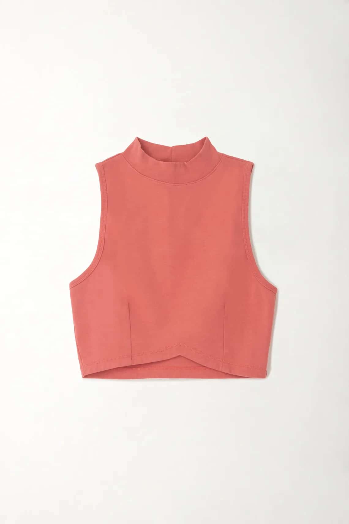 Camiseta crop ajustada con ruedo asimétrico rosada para mujer