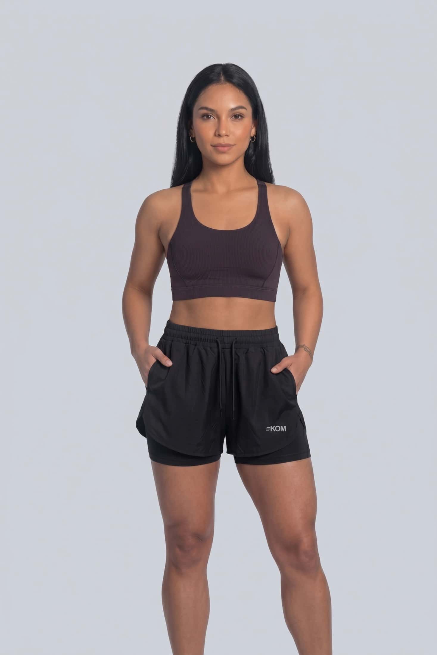 Short Running Deportivo Mujer Línea Giro con Boxer Interno y Bolsillos