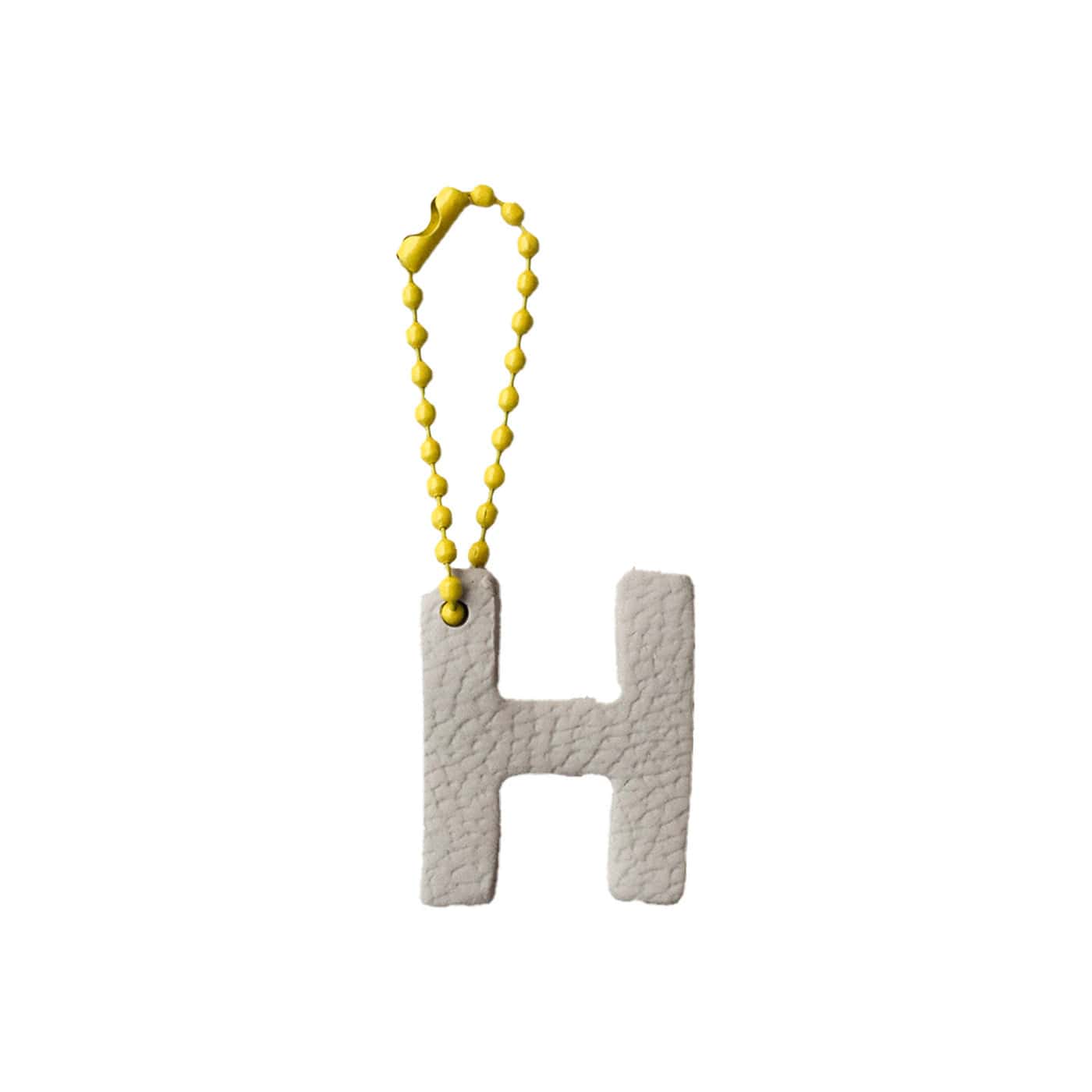 Charm Letra redonda H Latte