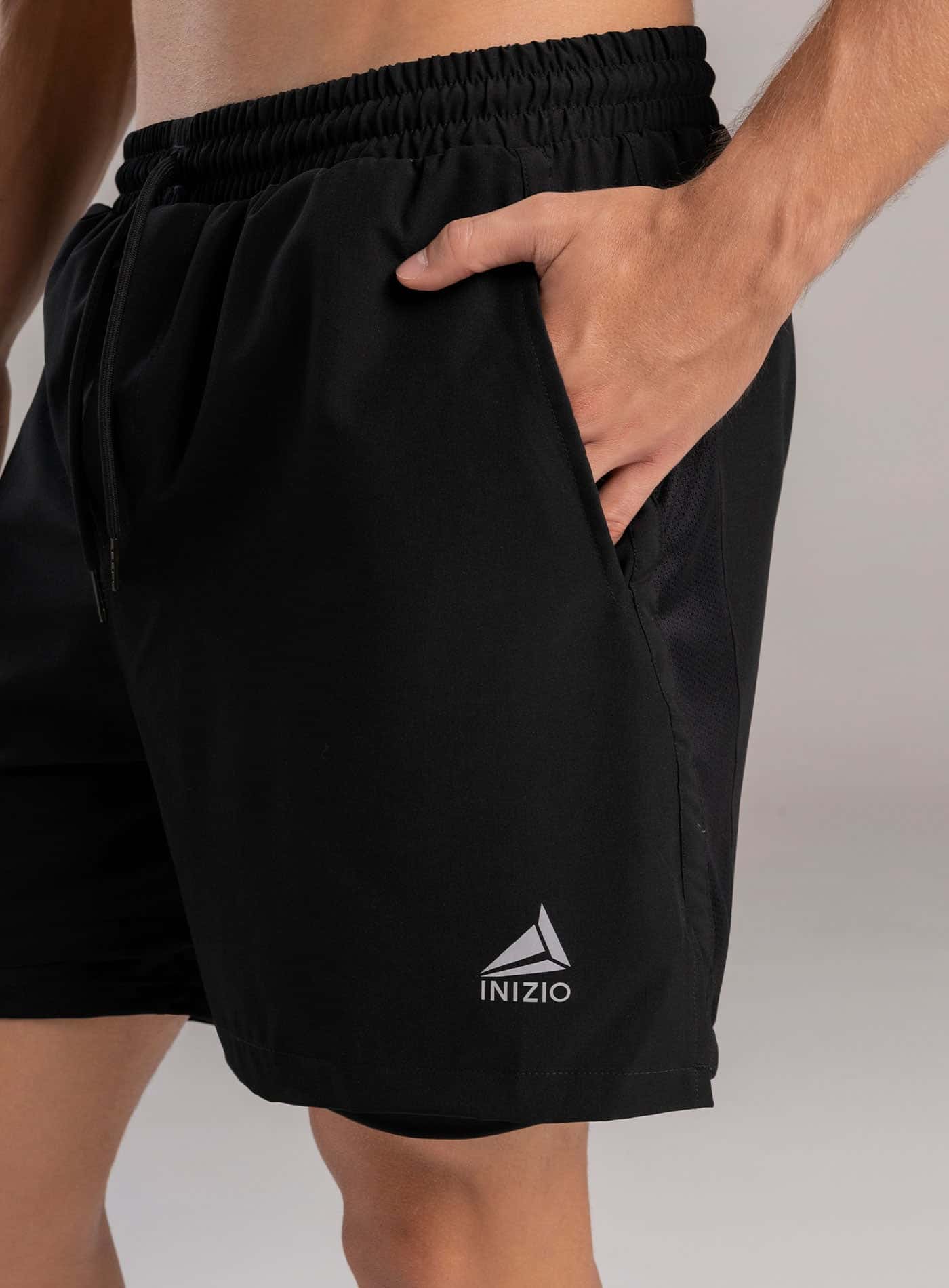 PANTALONETA DEPORTIVA SEMI IMPERMEABLE CON MALLA EN COSTADO INCLUYE SHORT INTERNO - miniatura 2