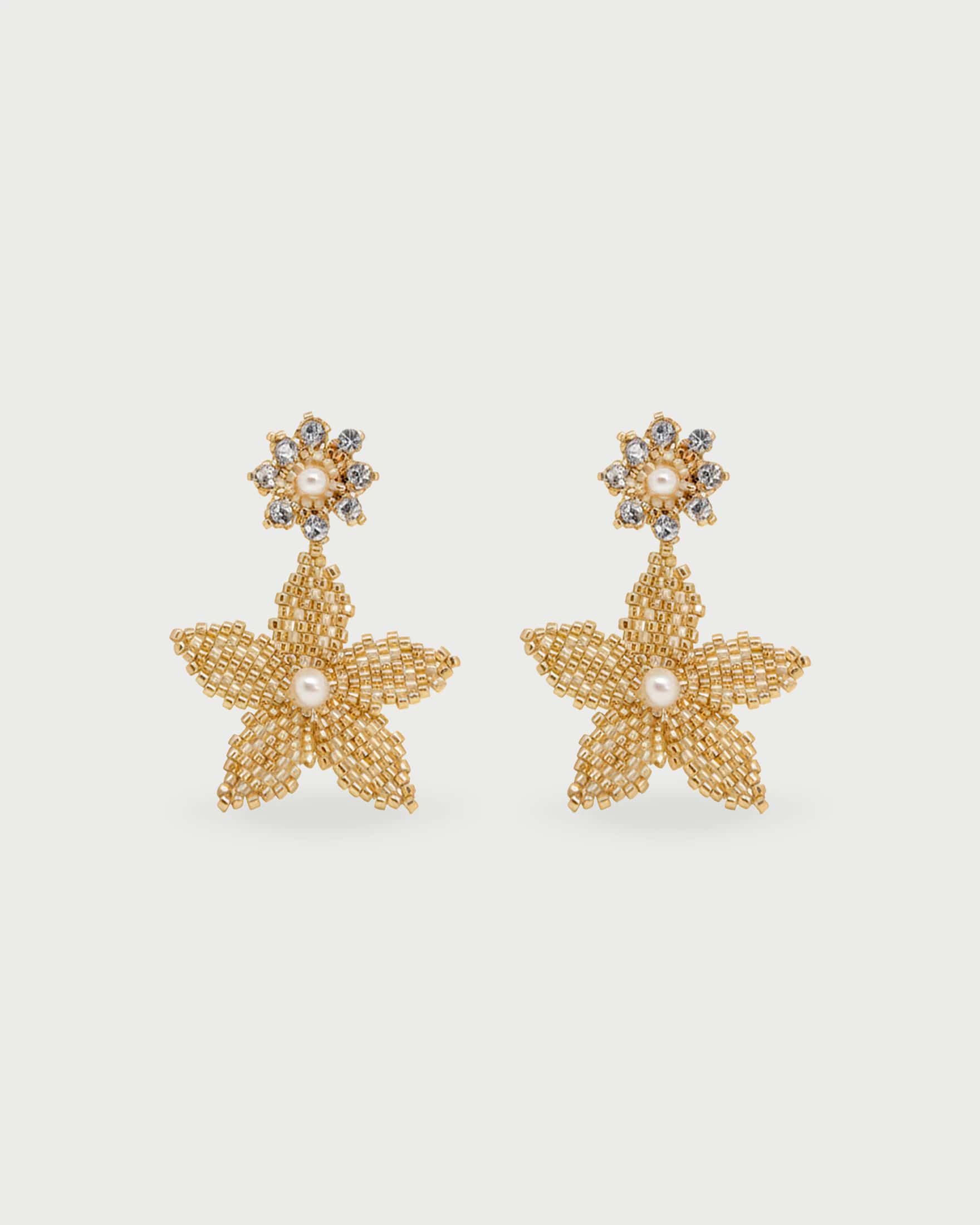 Aretes Tejidos Dos Flores