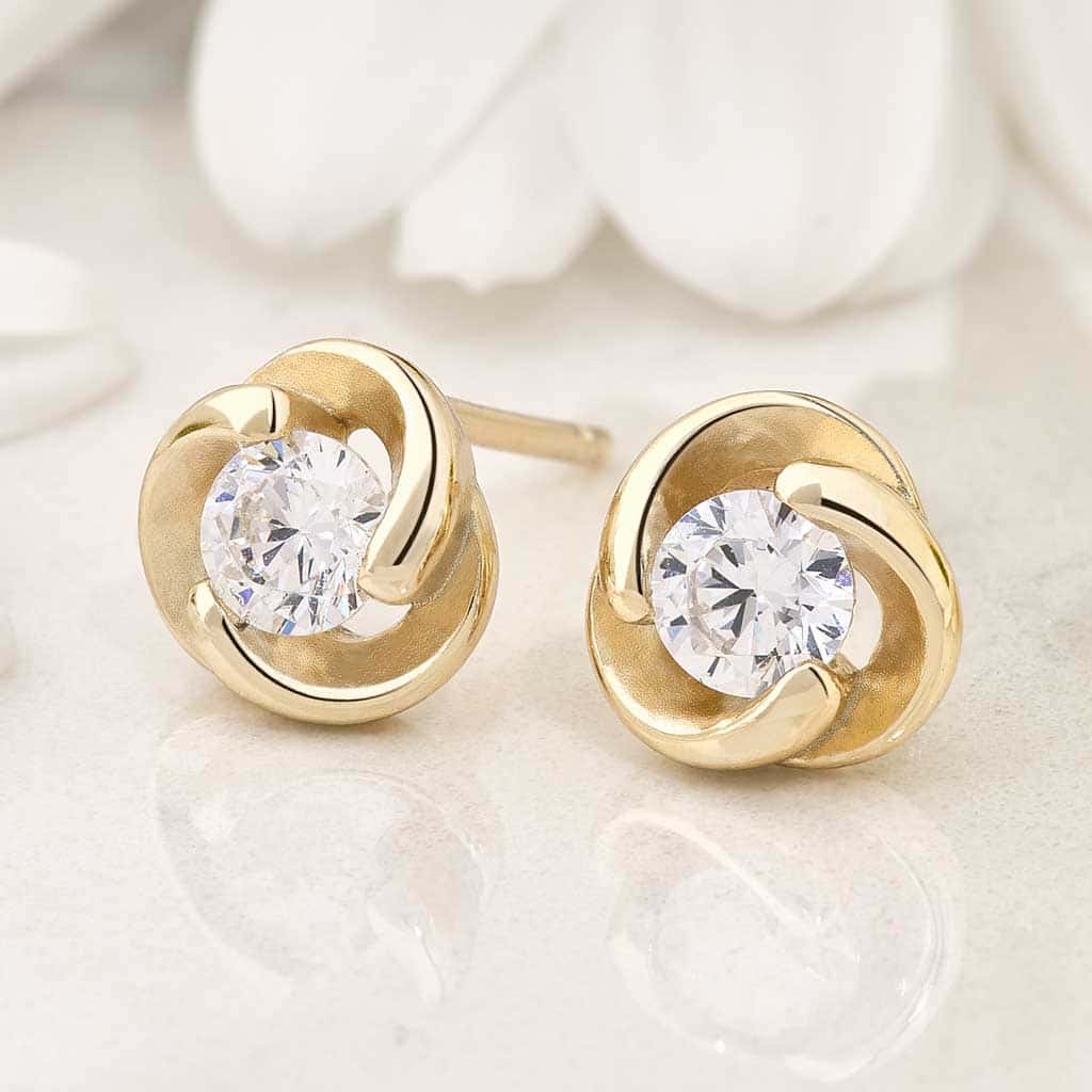 Aretes Topi
