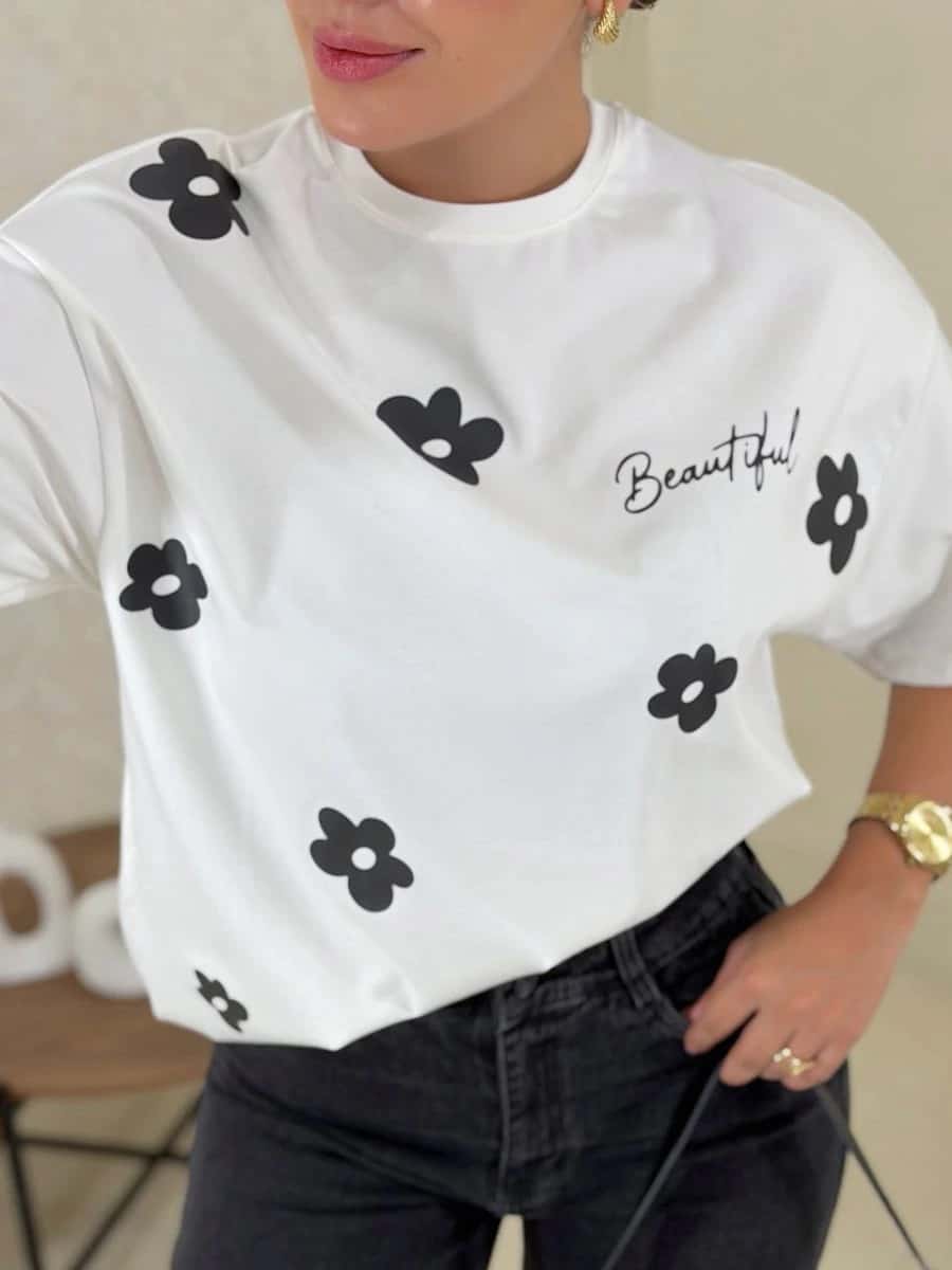 Camiseta oversized flores crudo