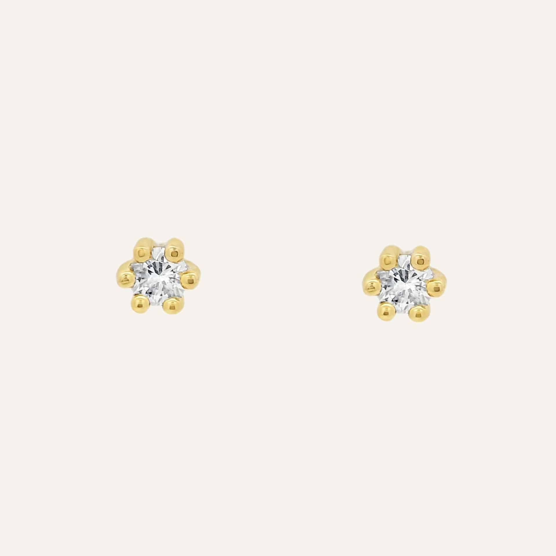 Arete Seis uñas diamantes