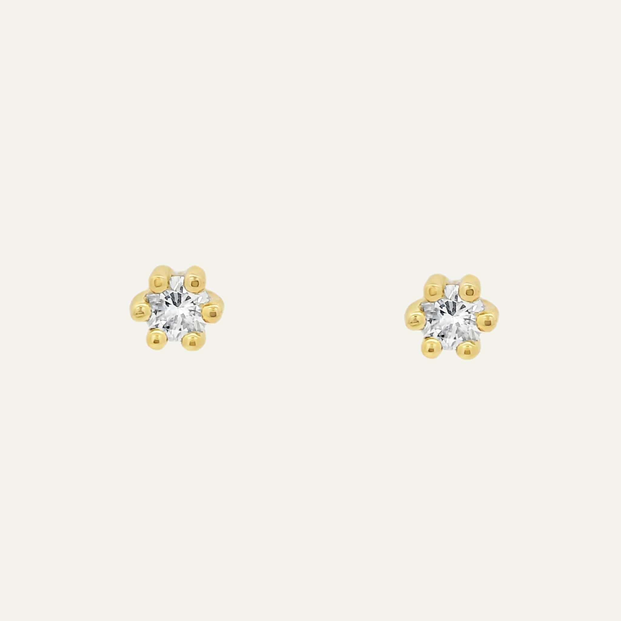 Arete Seis uñas diamantes