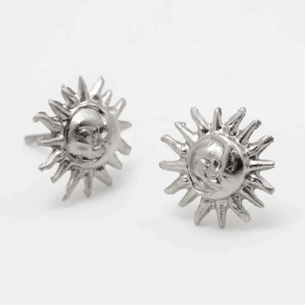 Aretes Sol de Rumbo Plateado