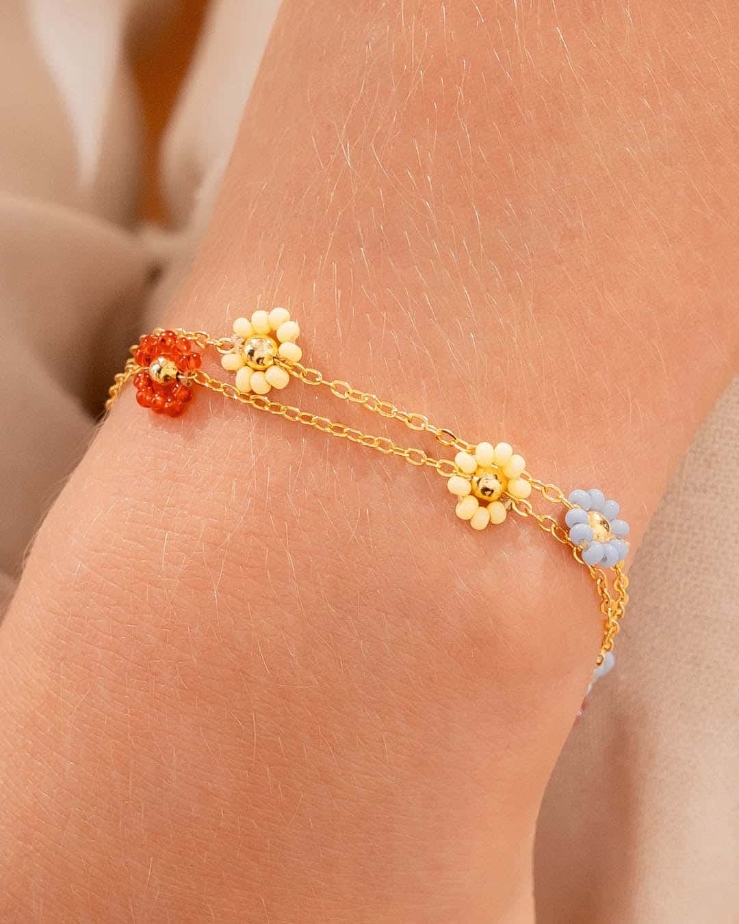 Pulsera Flores Multicolor + Aretes