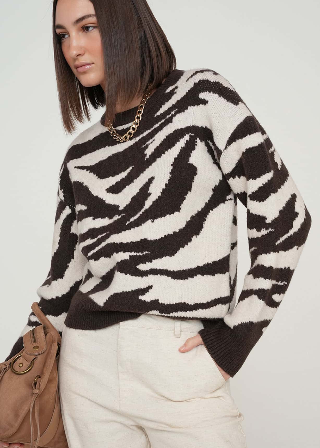 Buzo tejido de animal print