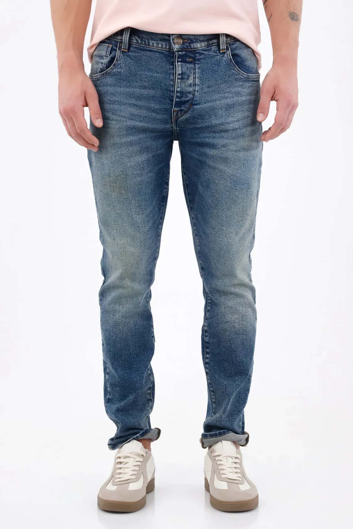Jean skinny con lavado desgastado en denim de algodón azul medio para hombre